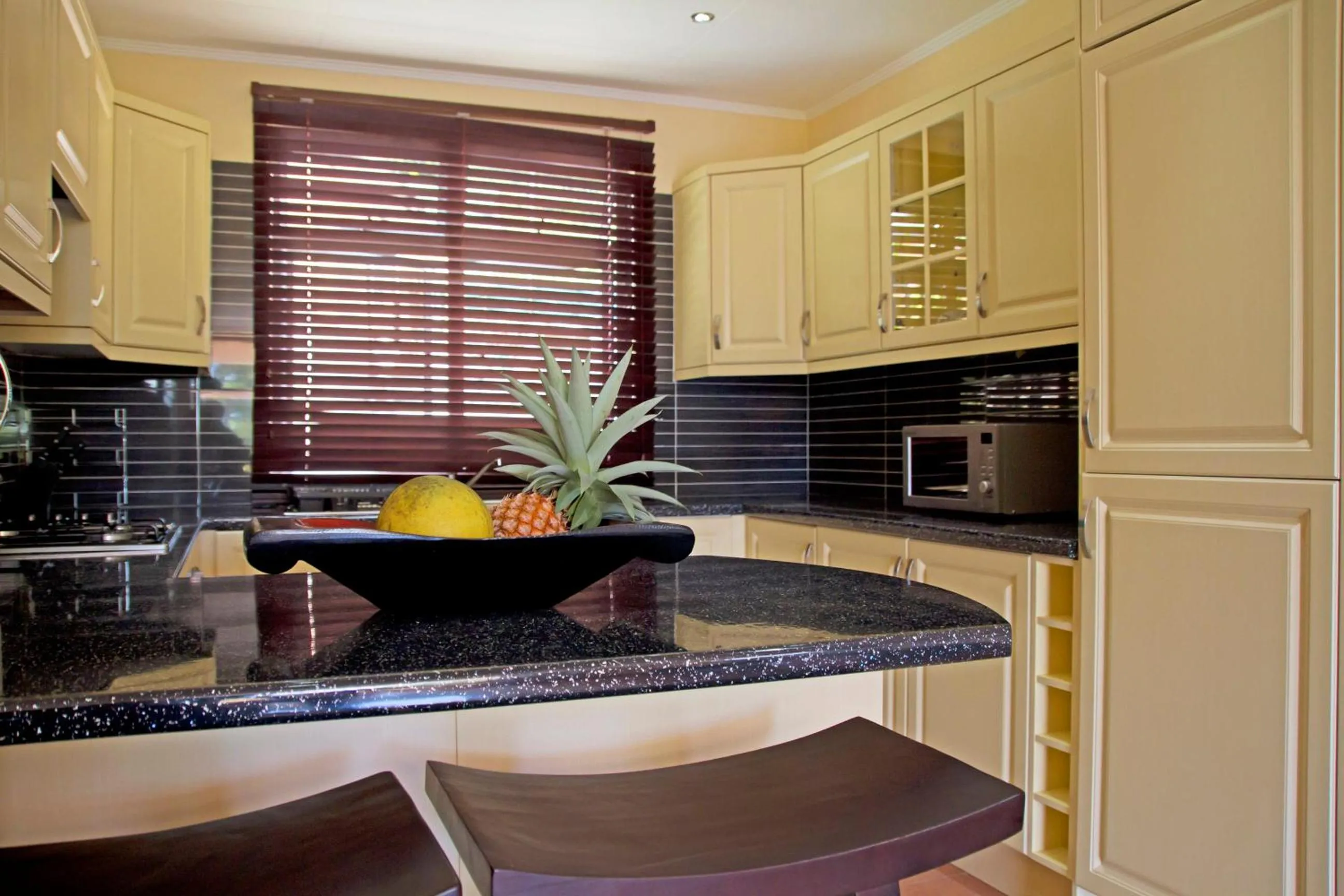 Kitchen or kitchenette in The Palm Seychelles