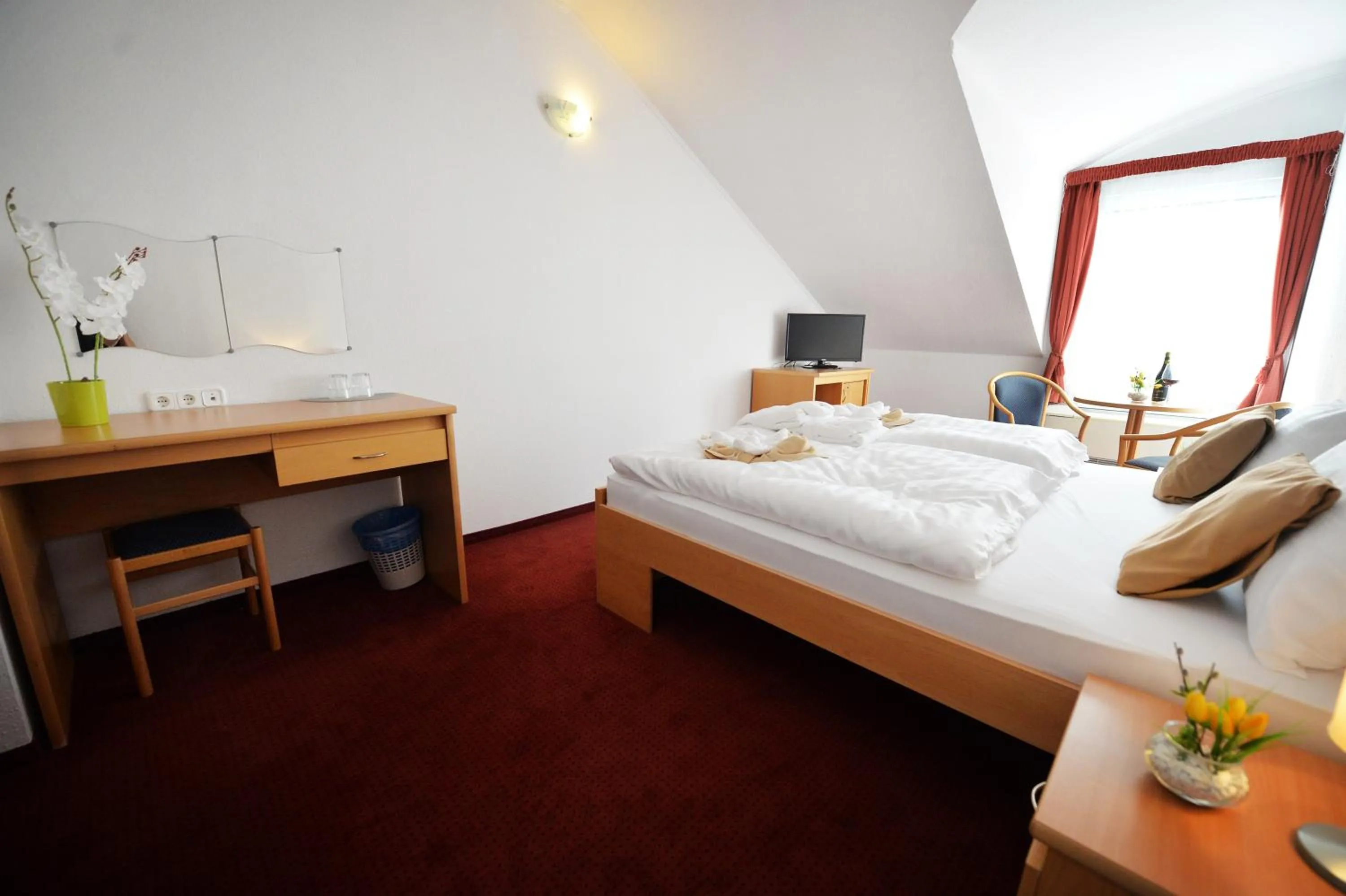 Seating area, Bed in Panorama Hotel Noszvaj