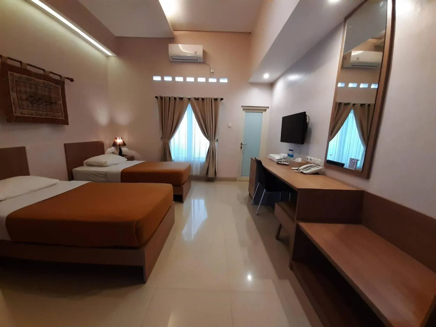 Bed in The Sriwijaya Hotel - Halal Hotel