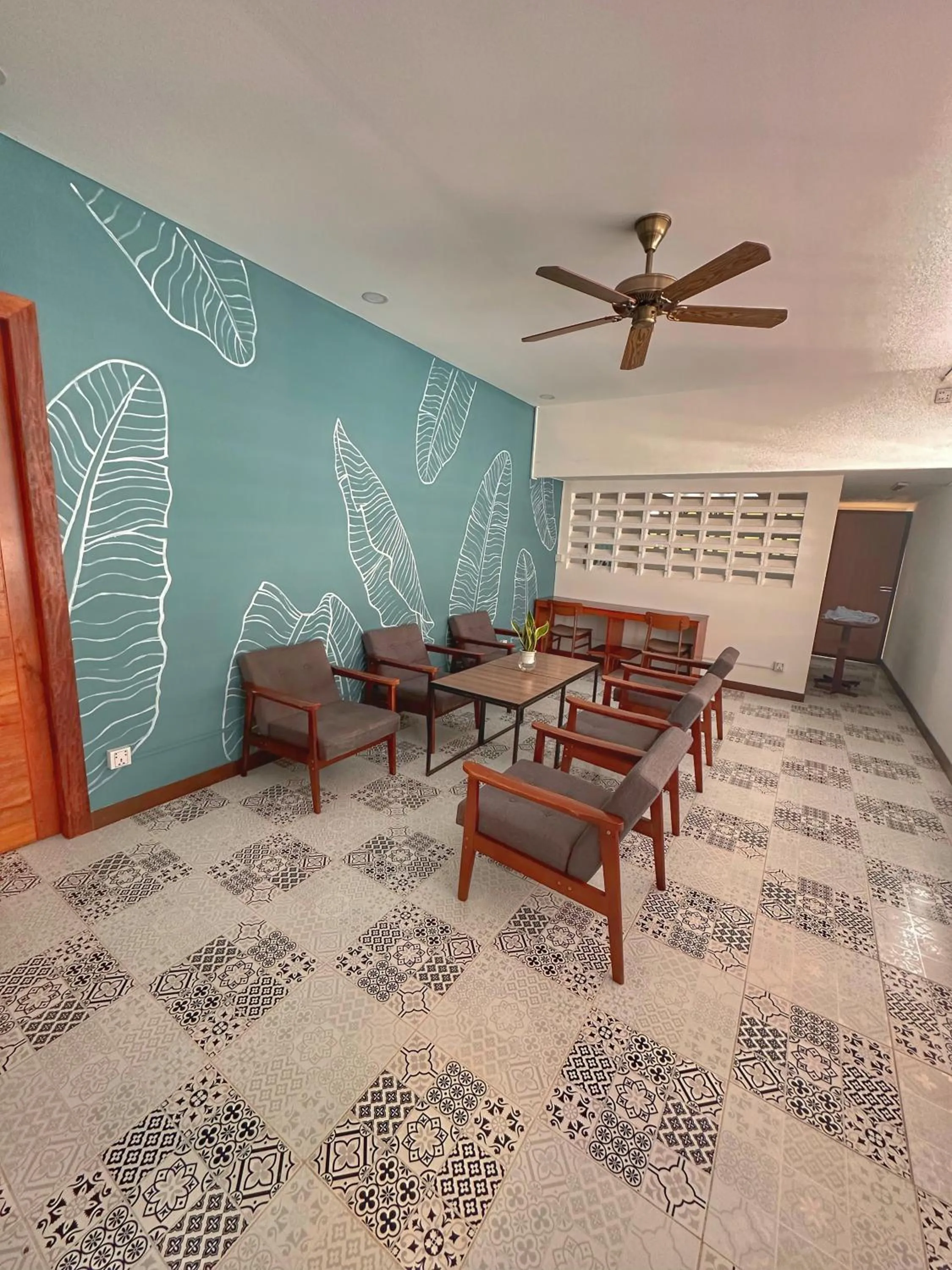 Seating area in Monsoon Riverside Hotel