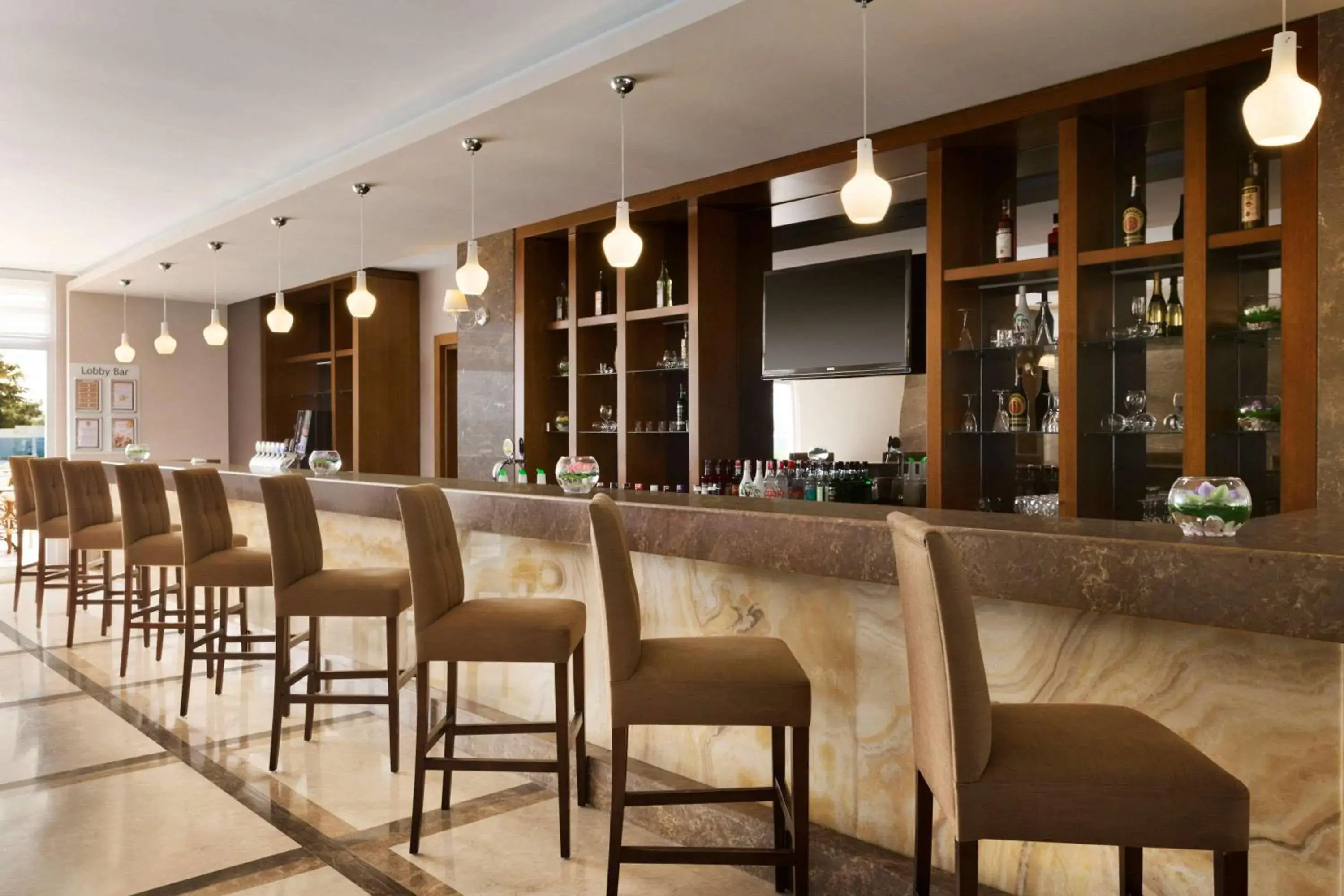 Lounge or bar in Ramada Resort Side Lounge or bar in Ramada Resort Side