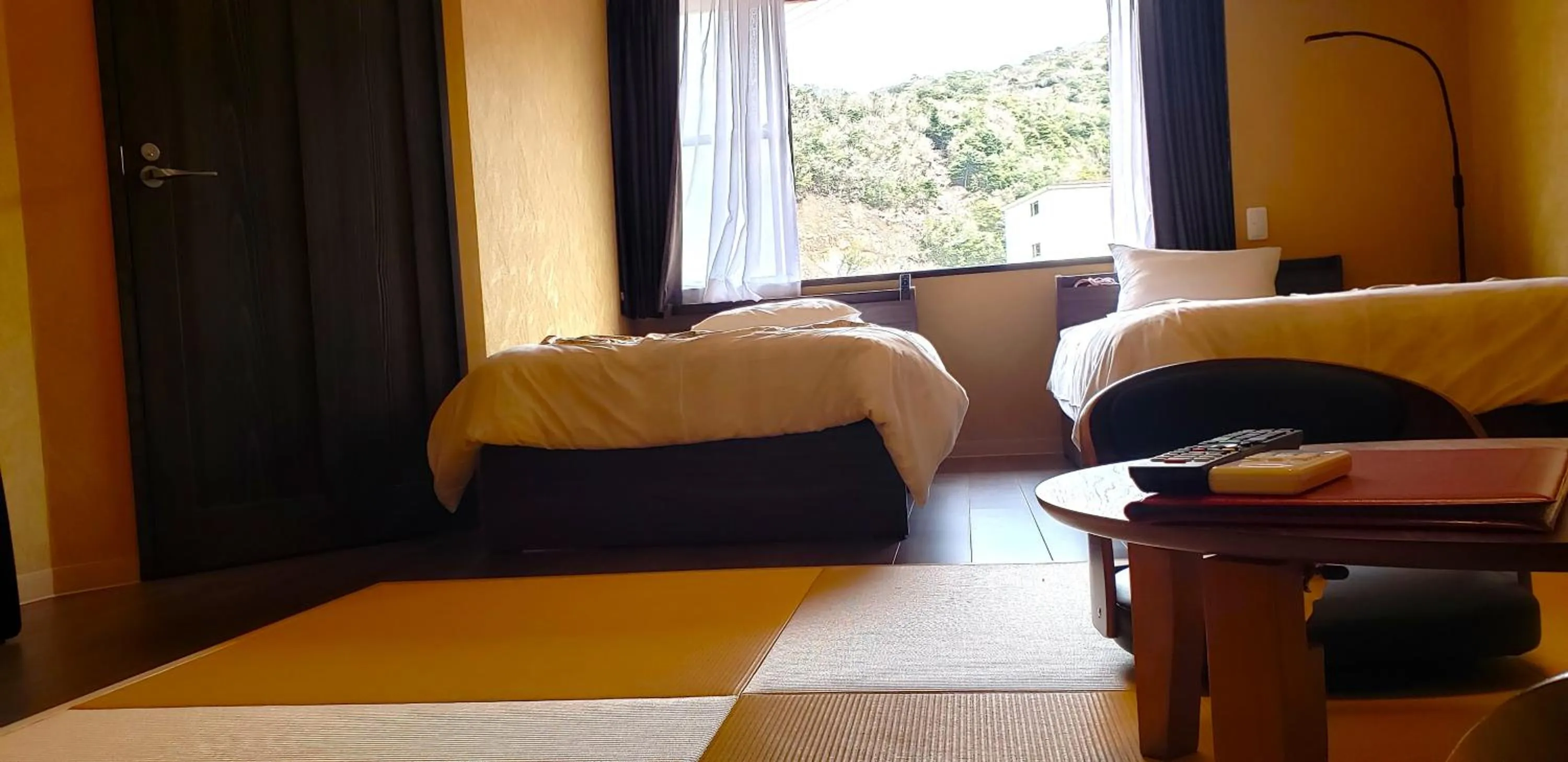 Bed in Unzen Sky Hotel