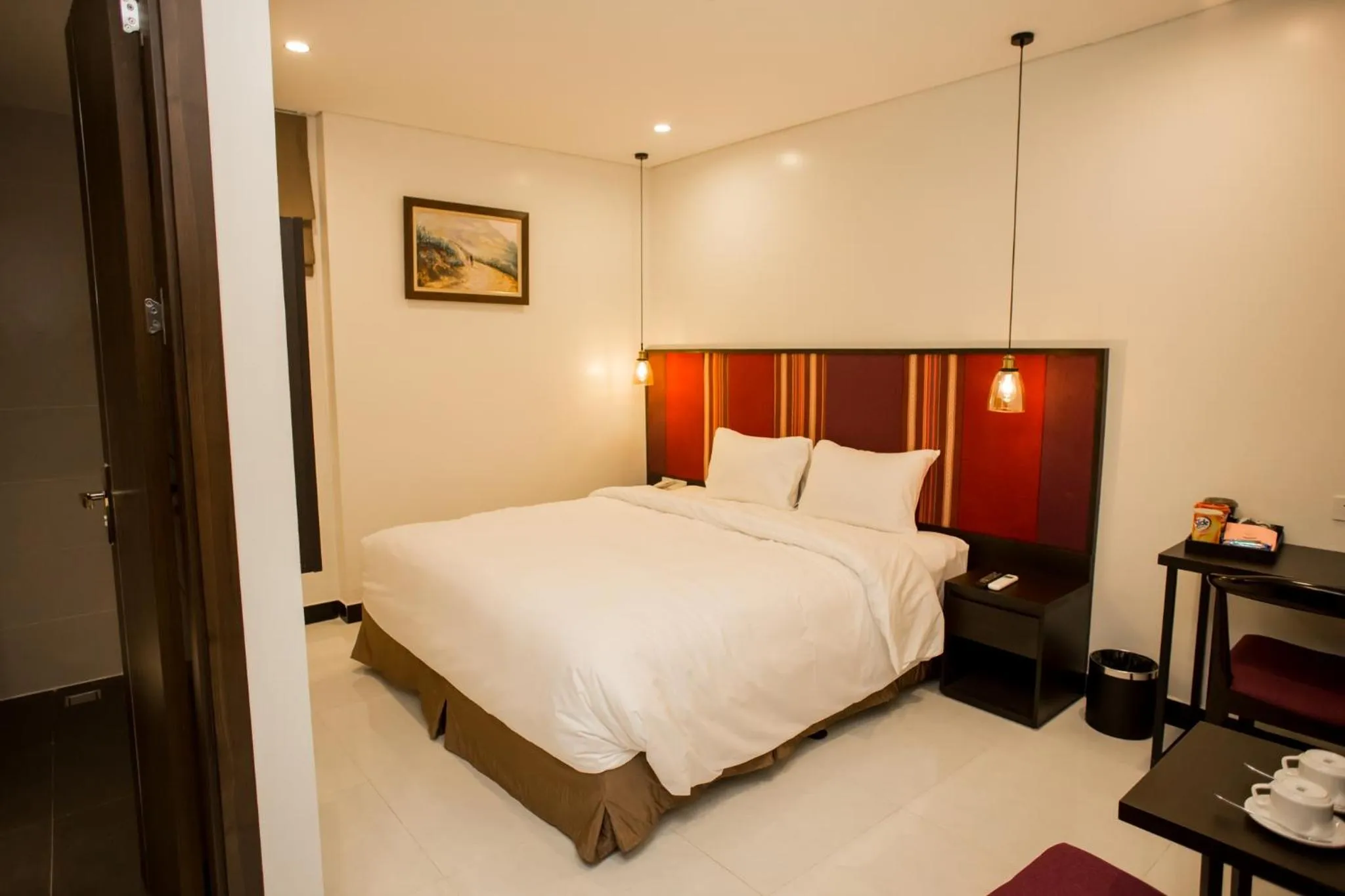 Bed in Max Boutique Hotel