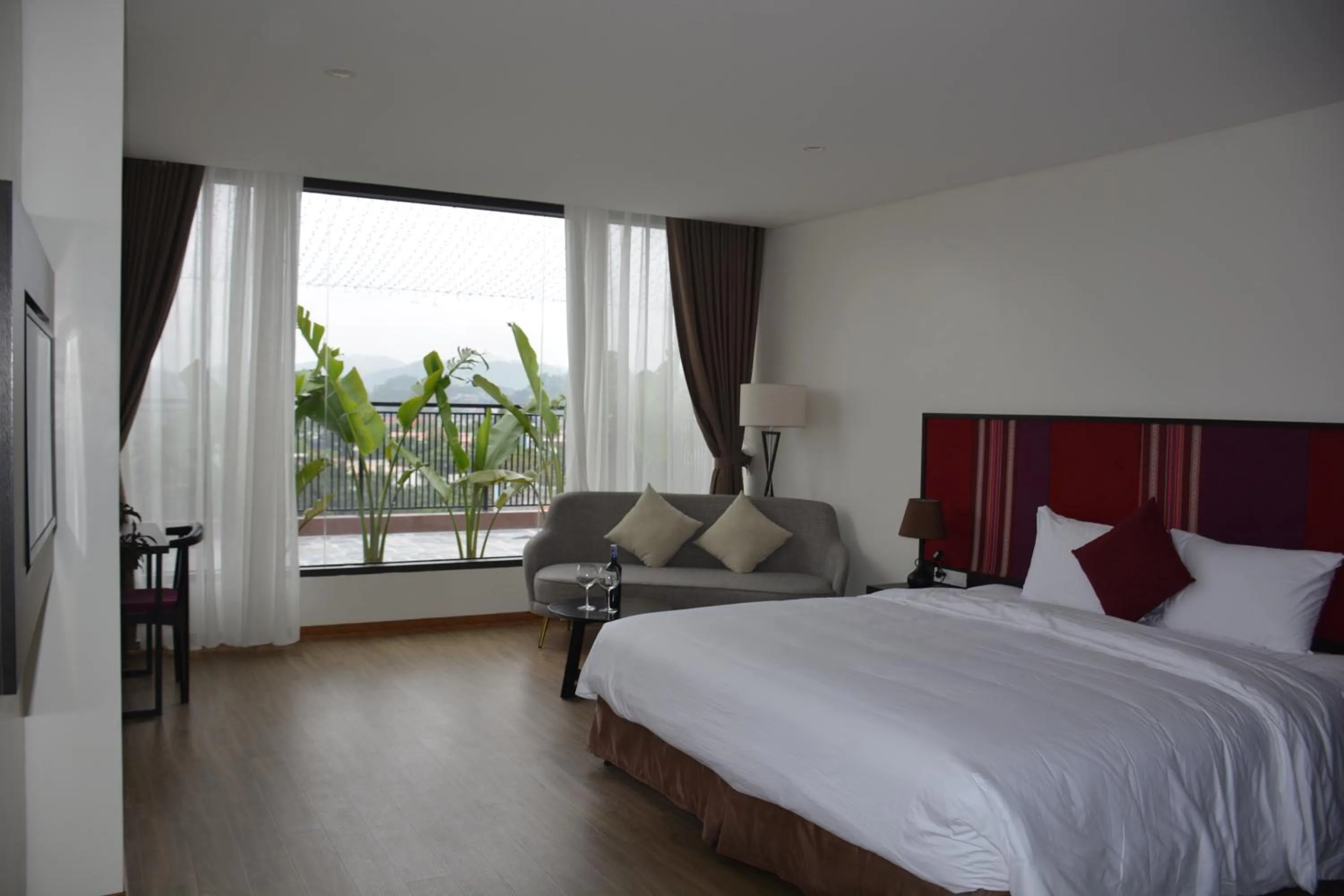 Bed in Max Boutique Hotel