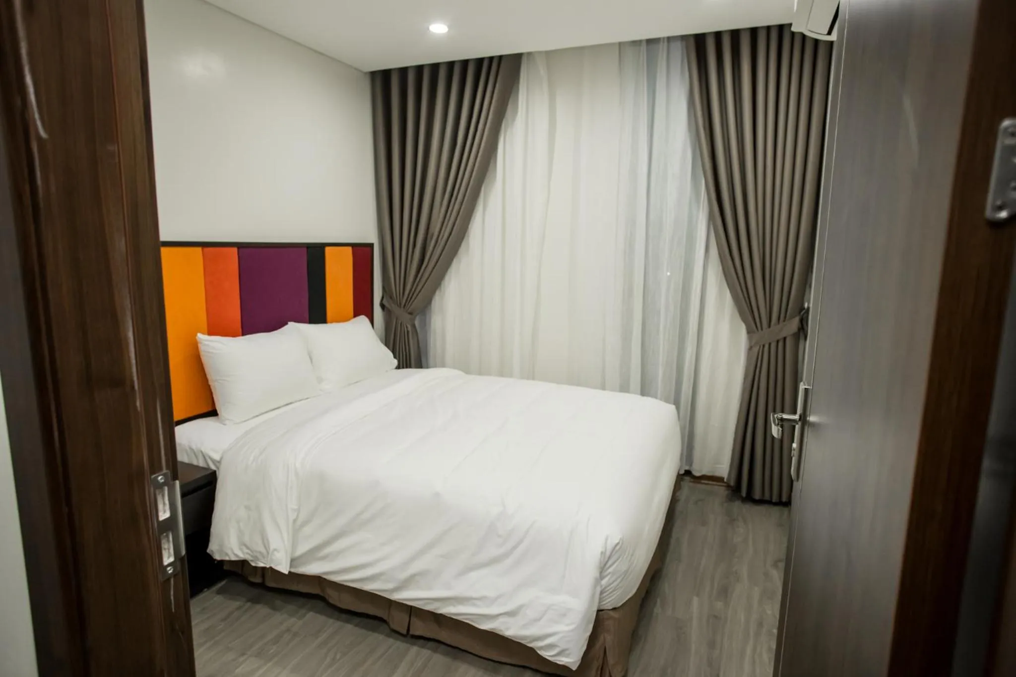 Bed in Max Boutique Hotel