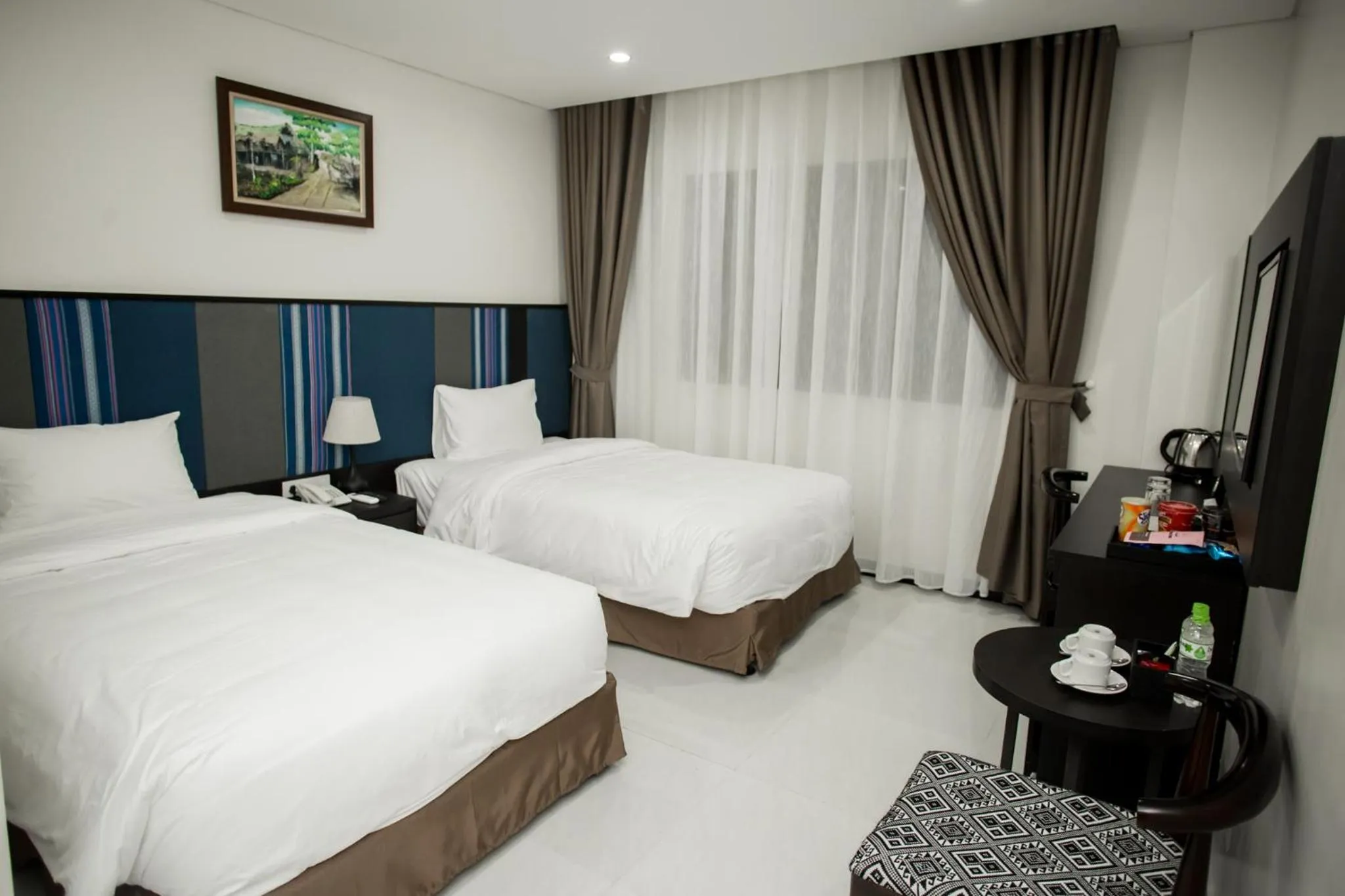 Bed in Max Boutique Hotel