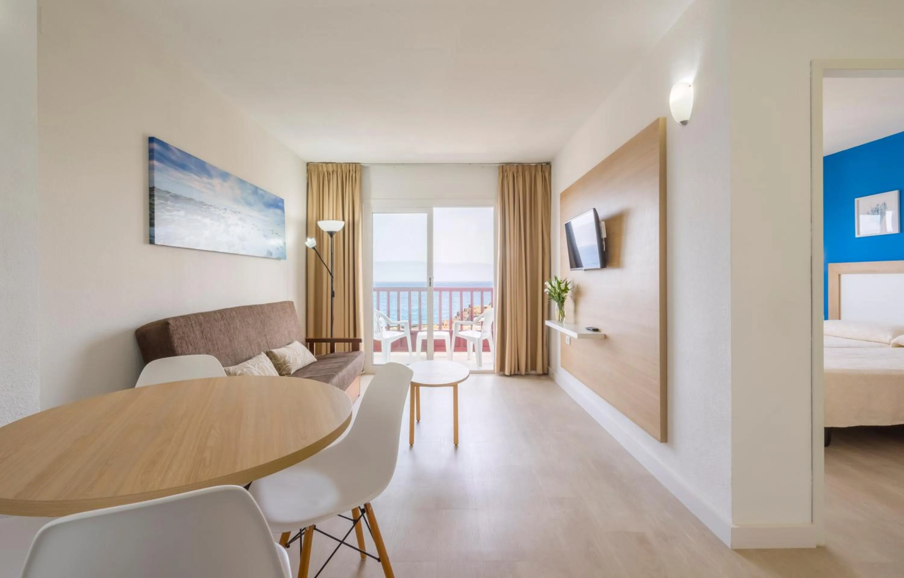 Dining area, Bed in Apartamentos Centro Cancajos
