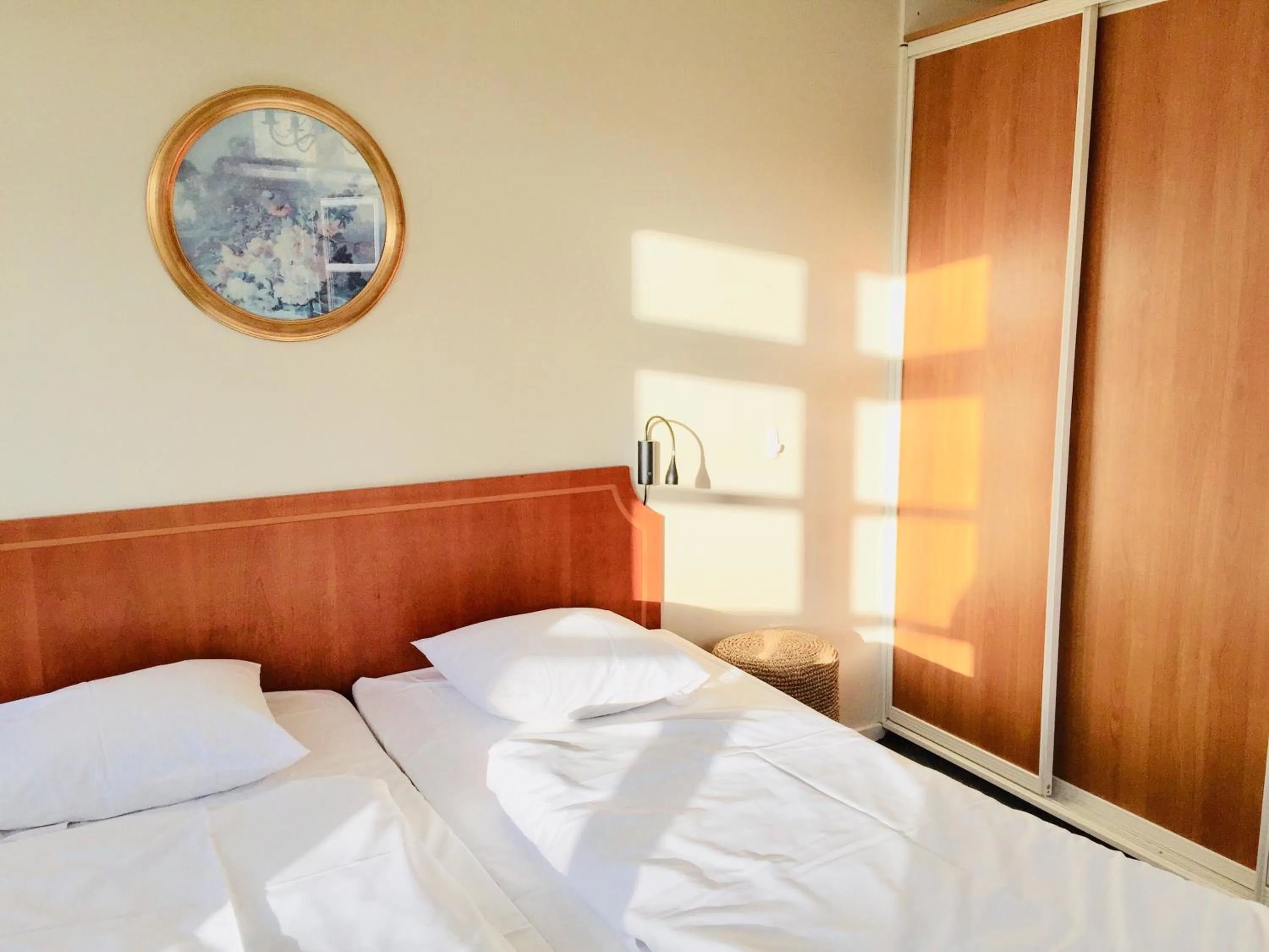 Bed in City Hotel Apartments