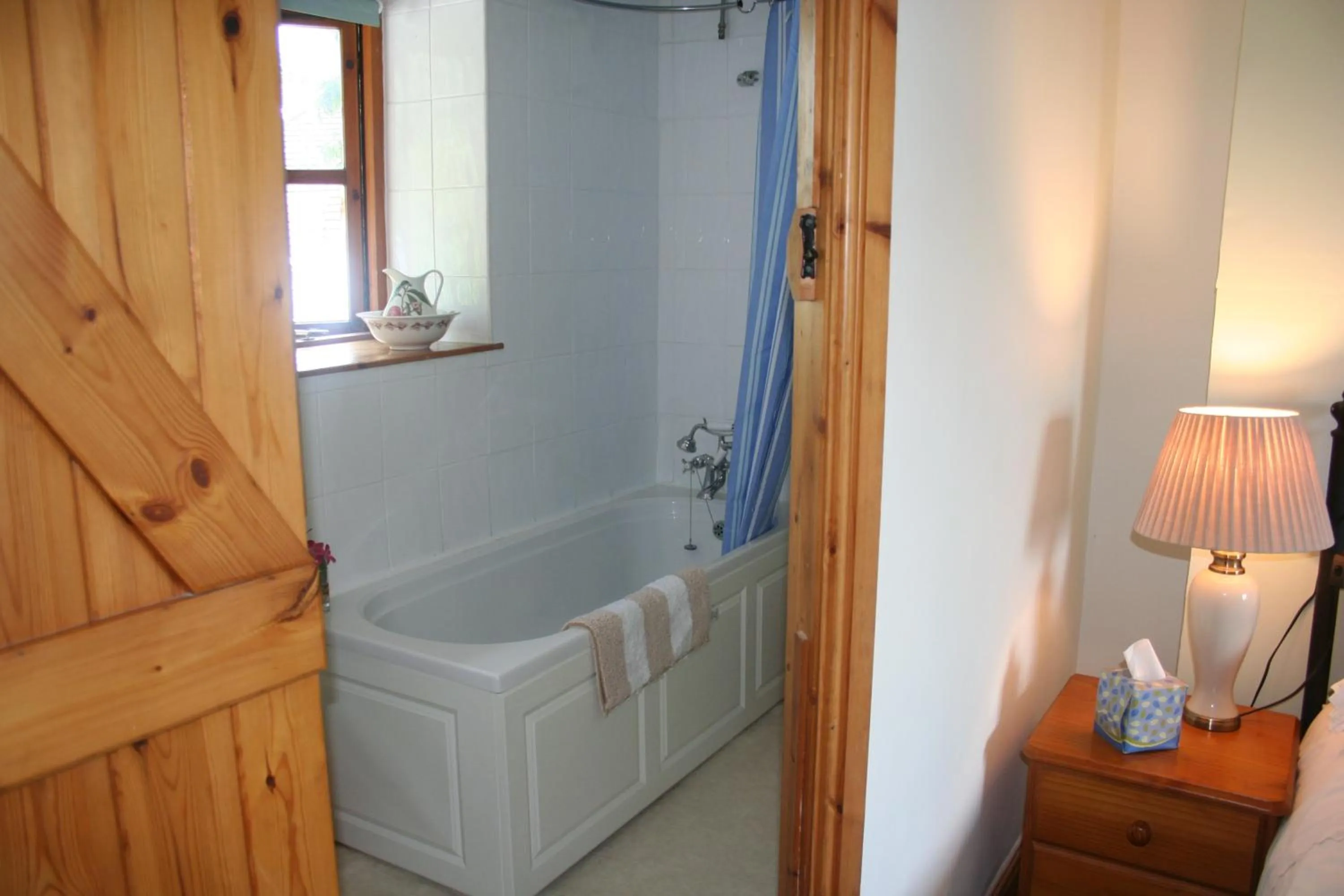 Bathroom in Barn Cottage - Farm Park Stay with Hot Tub