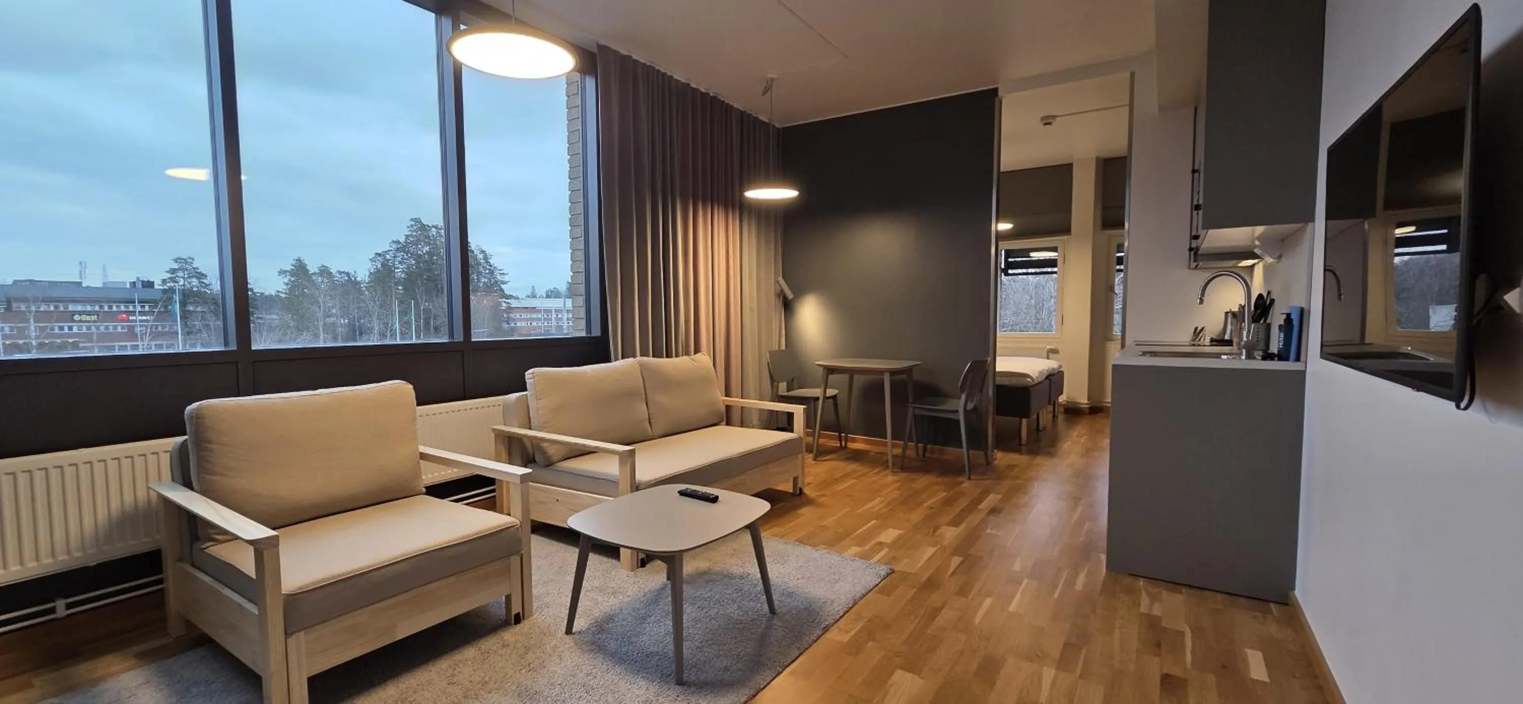 Living room in First Hotel The Studio