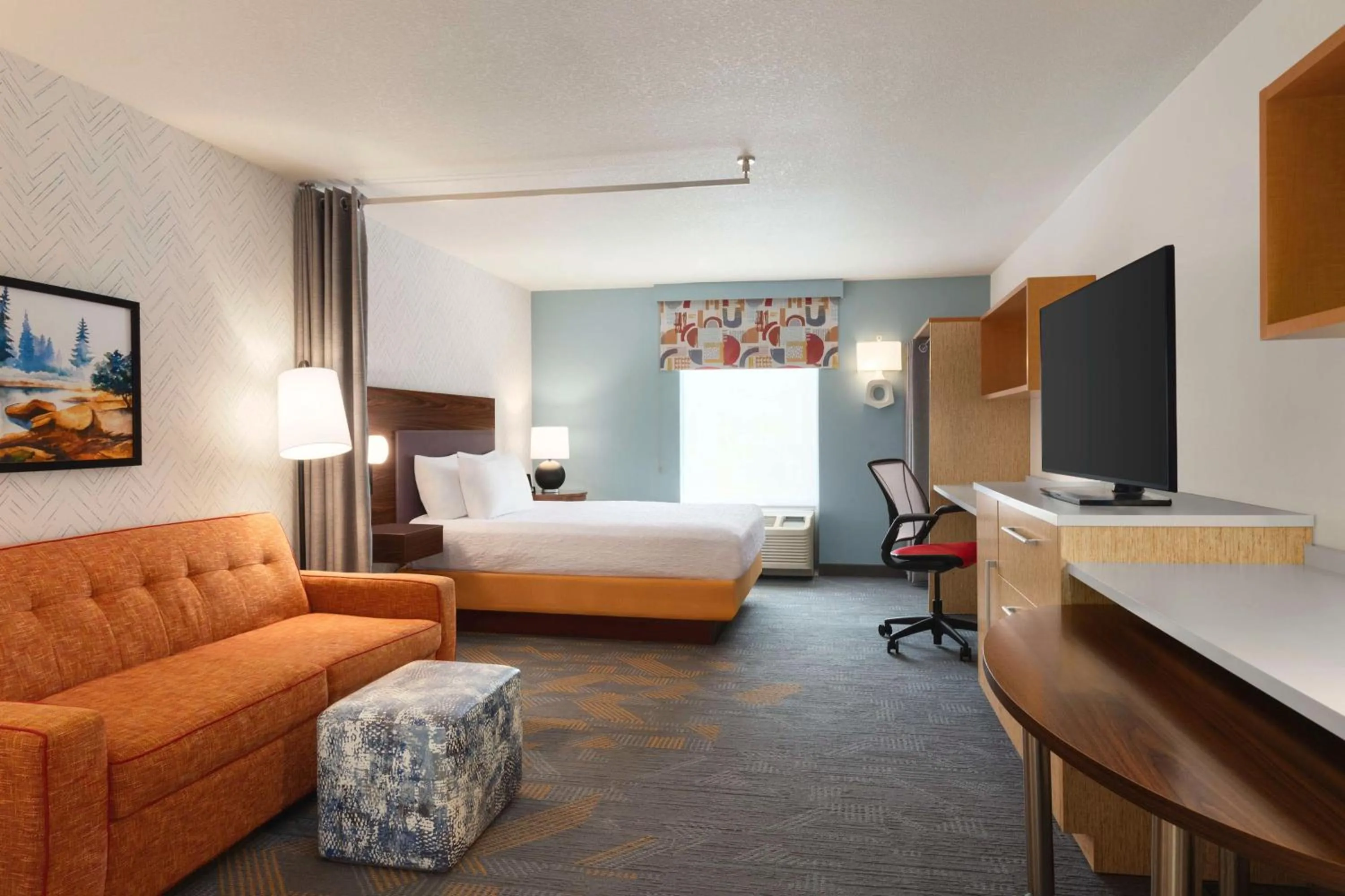 Living room, Bed in Home2 Suites by Hilton - Oxford