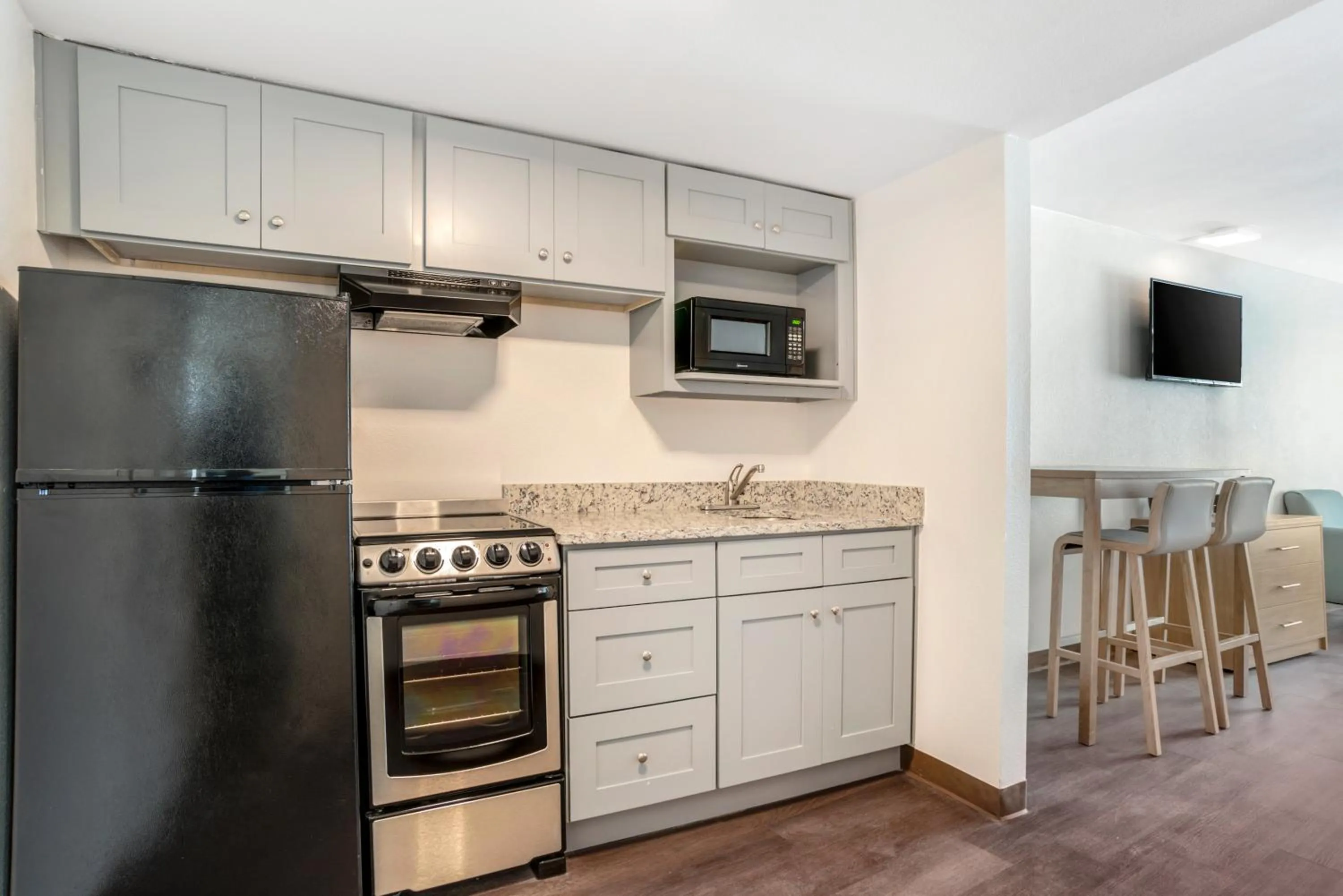 Kitchen or kitchenette in Chateau Beachfront Hotel, a By the Sea Resort