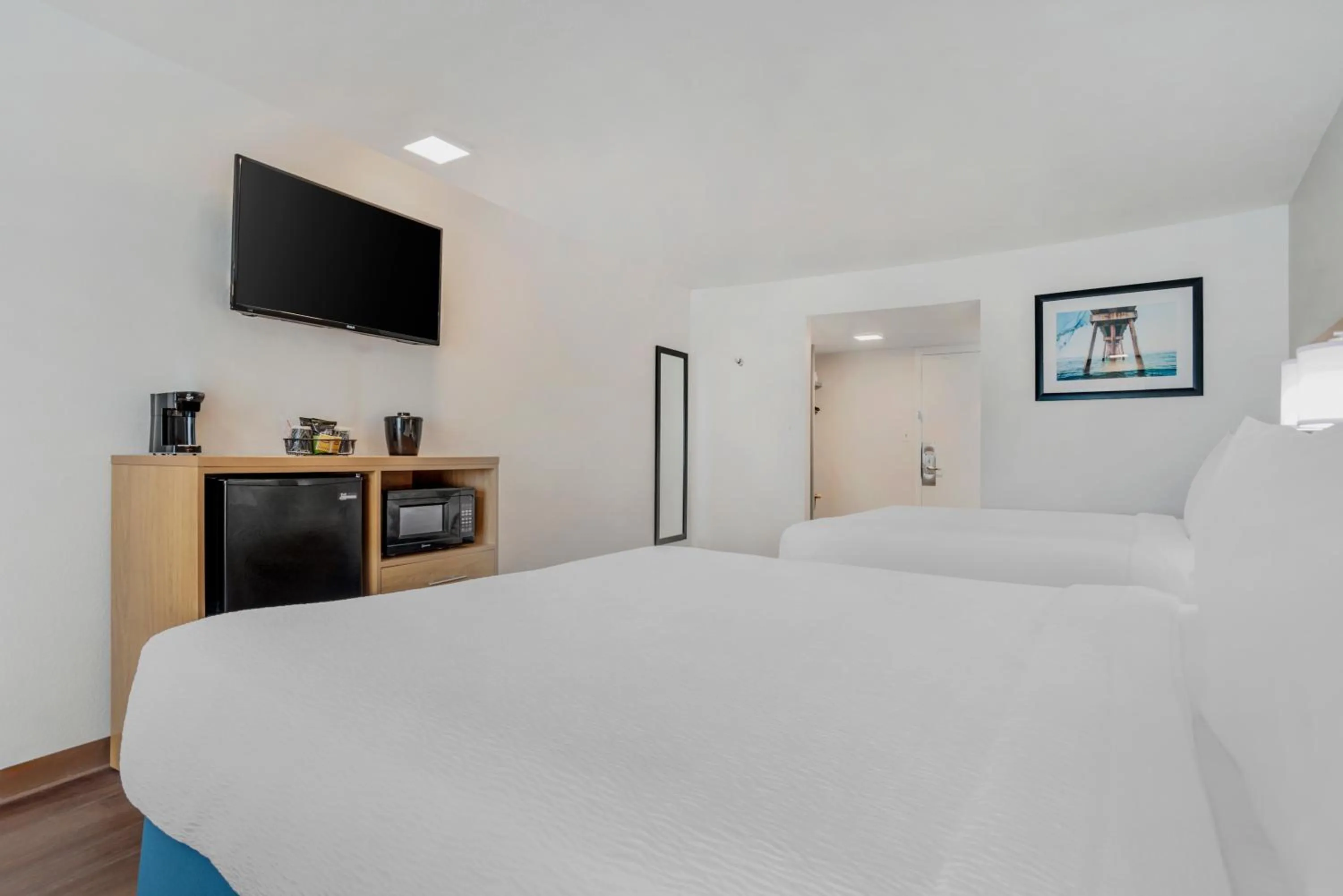 Bed in Chateau Beachfront Hotel, a By the Sea Resort