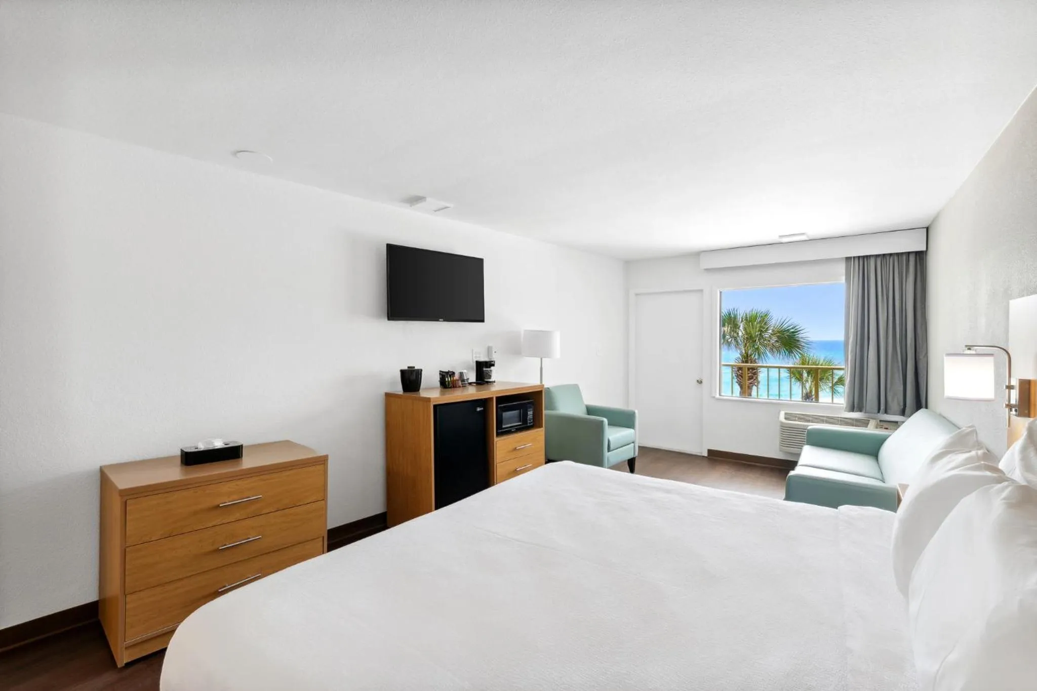 Bed in Chateau Beachfront Hotel, a By the Sea Resort