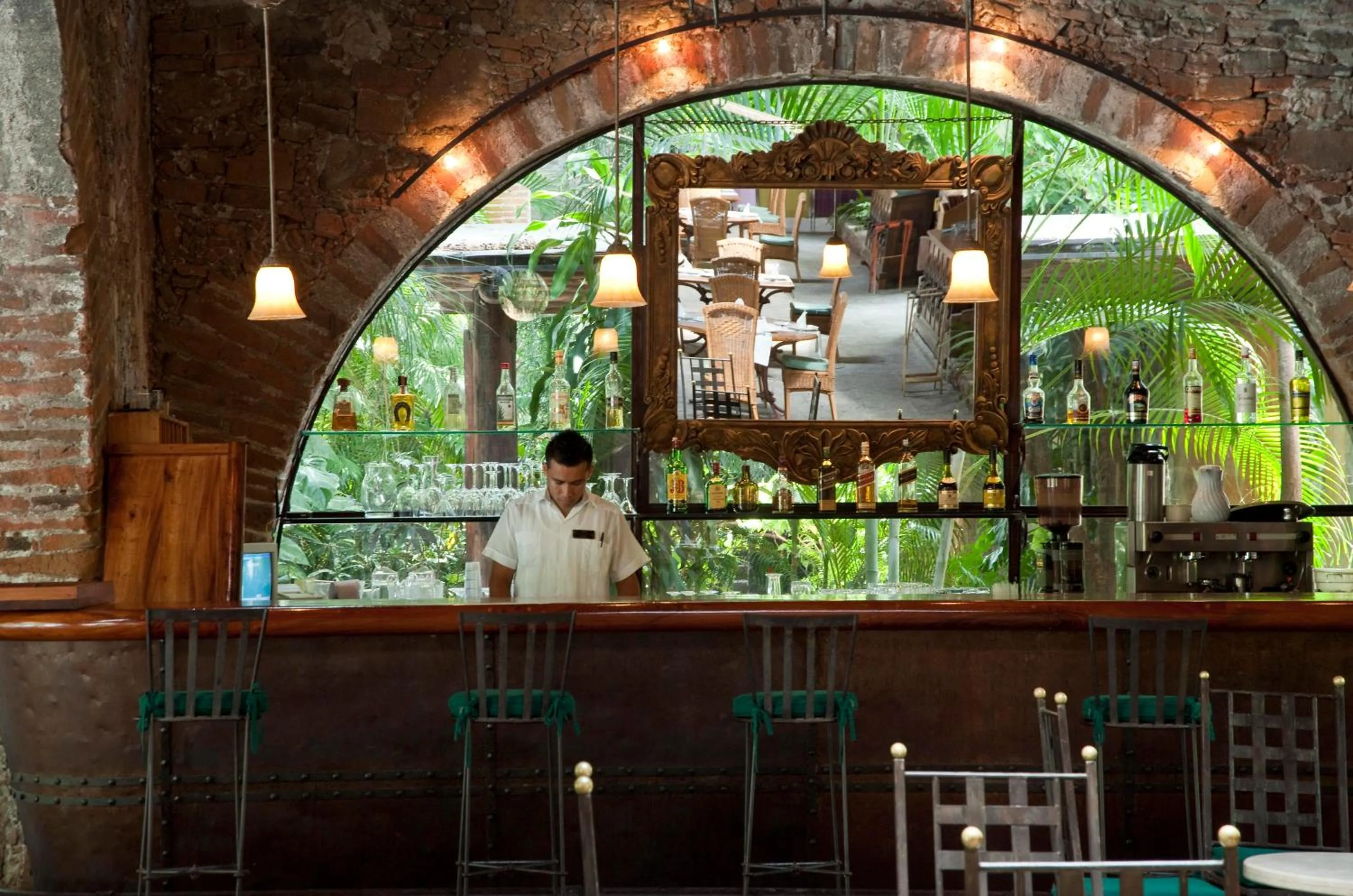 Lounge or bar in Hacienda San Gabriel de las Palmas