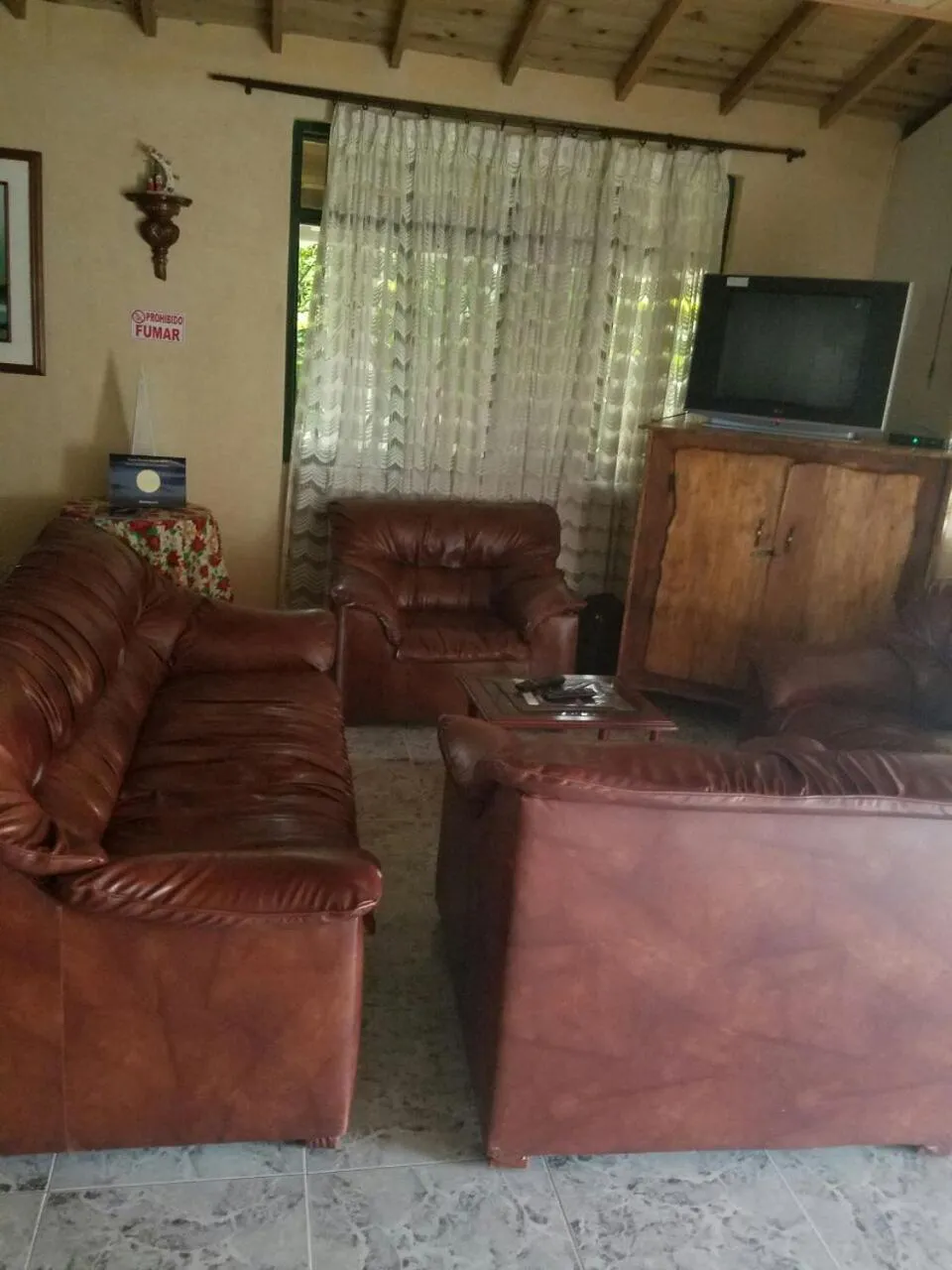 Communal lounge/ TV room in Casa Campestre La Colombiana