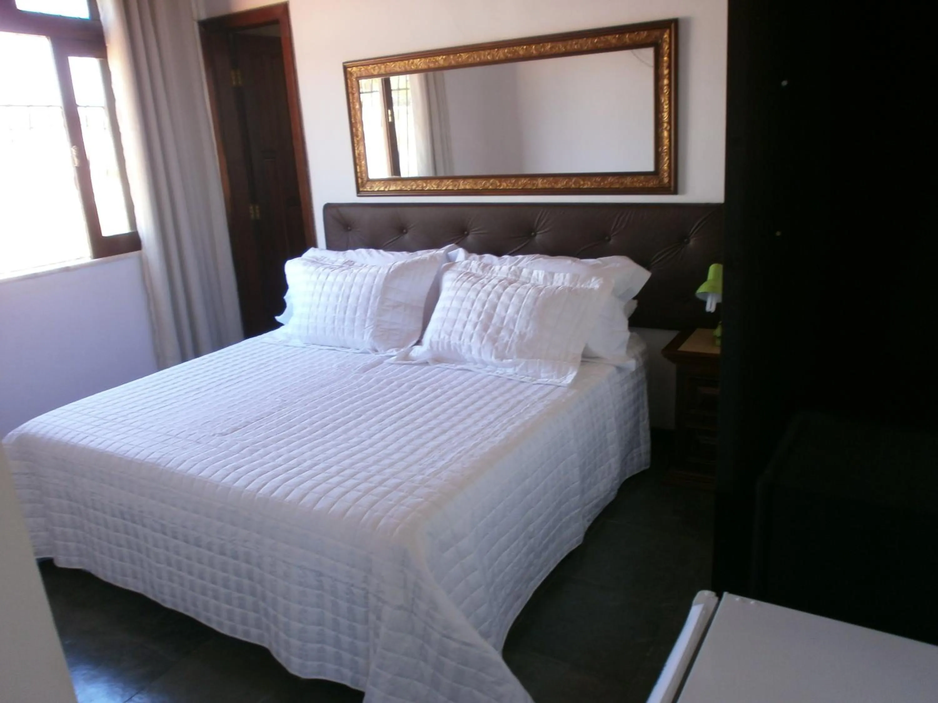 Photo of the whole room, Bed in Pousada da Mércia - Itapuã (BA)