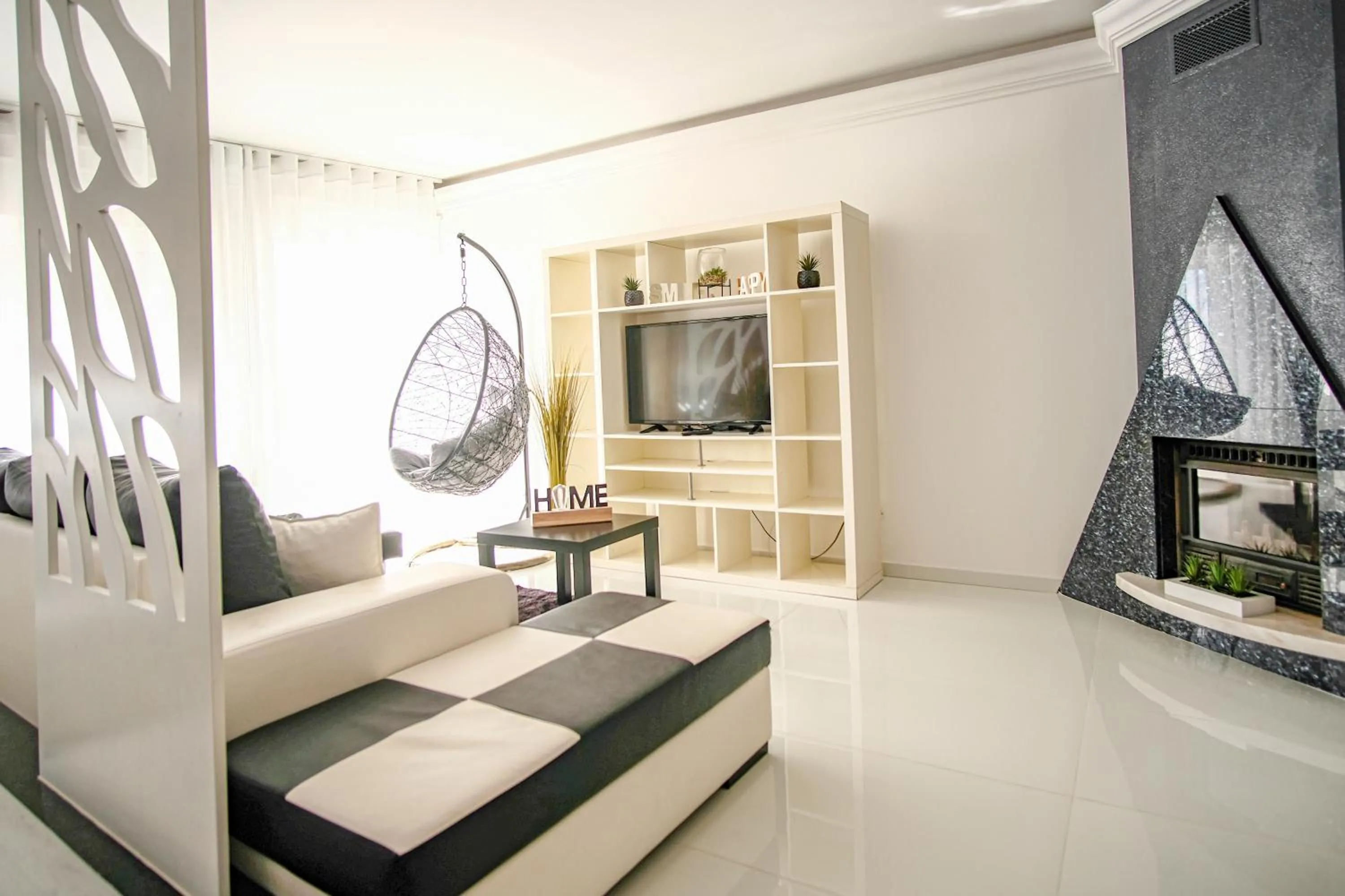 Communal lounge/ TV room in Préstige Holidays Alojamentos