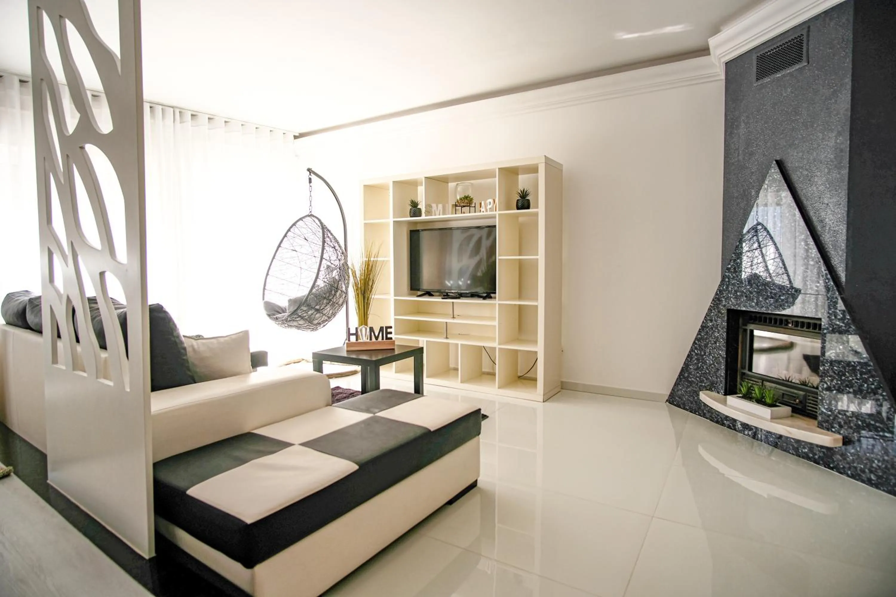 Communal lounge/ TV room in Préstige Holidays Alojamentos