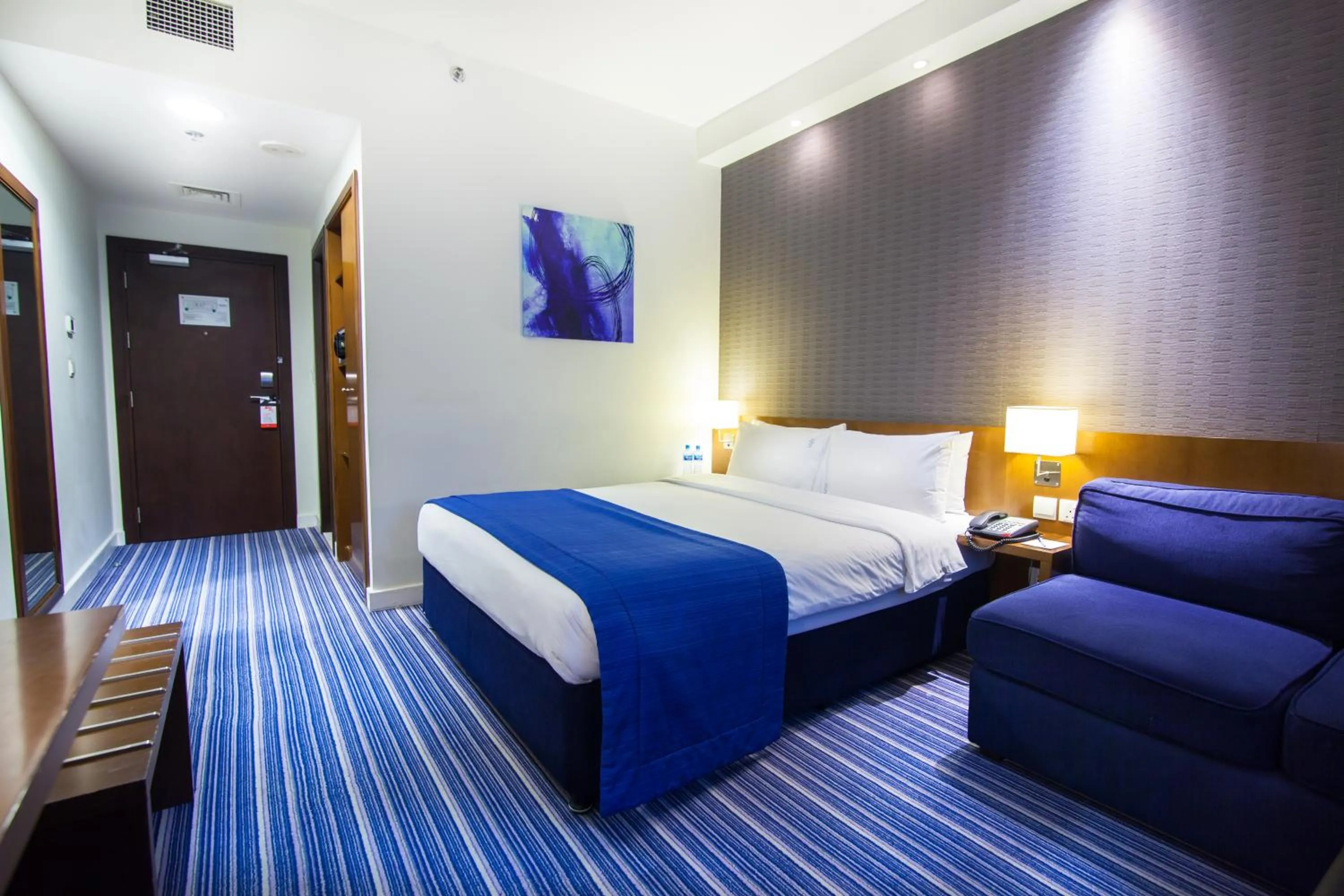 Photo of the whole room, Bed in Holiday Bahrain Hotel