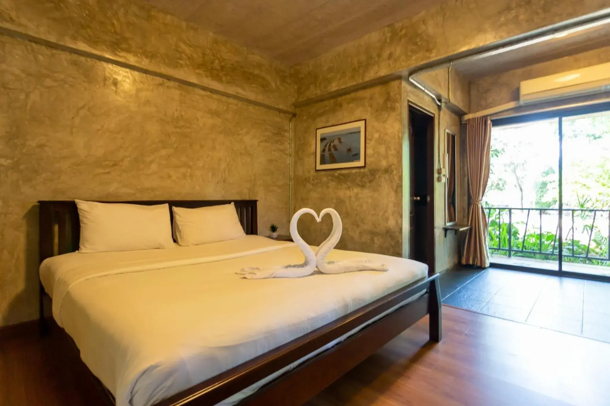 Bed in Baan Suan Ramita Resort Bed in Baan Suan Ramita Resort