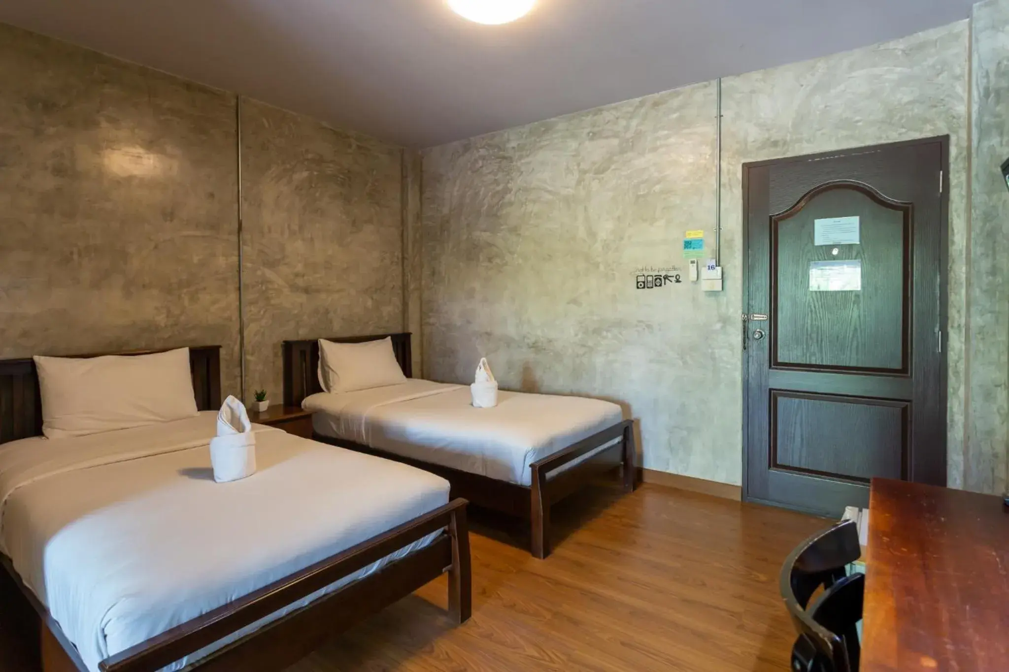 Bed in Baan Suan Ramita Resort Bed in Baan Suan Ramita Resort