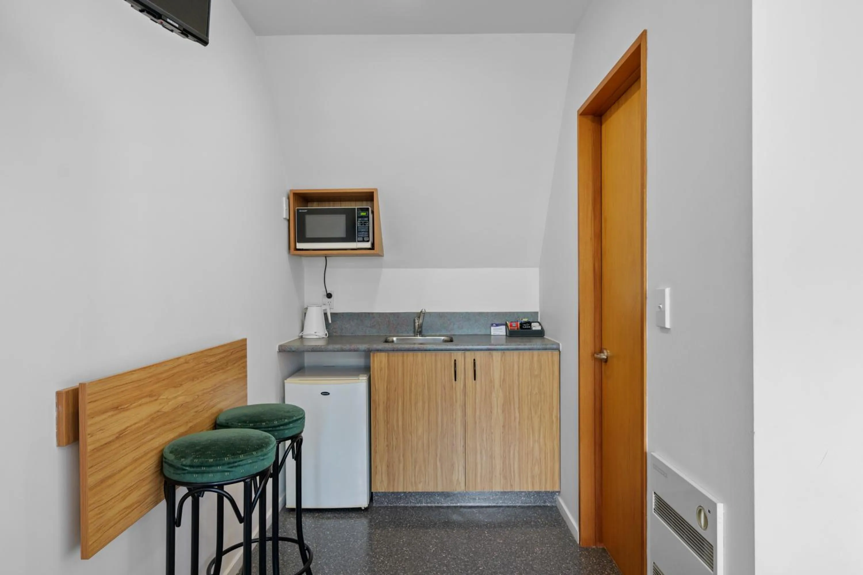 Kitchen or kitchenette in Bella Vista Motel & Apartments Christchurch