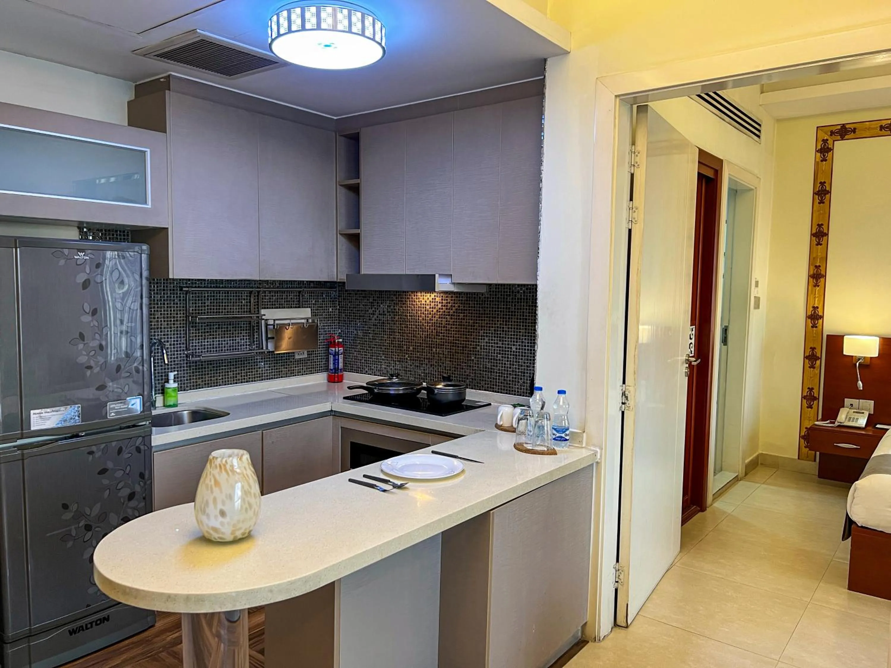 Kitchen or kitchenette in Coventina Lake Suites