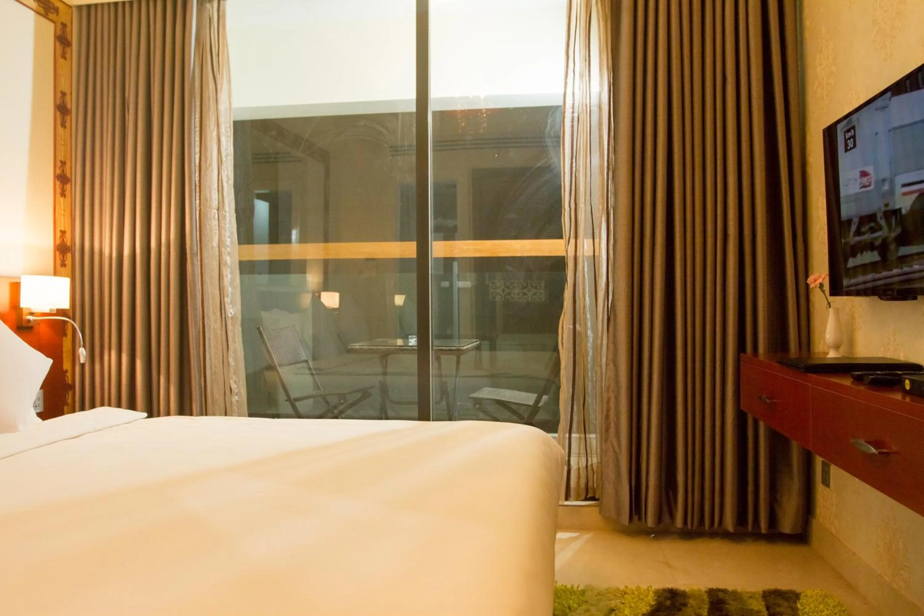 Bed in Coventina Lake Suites