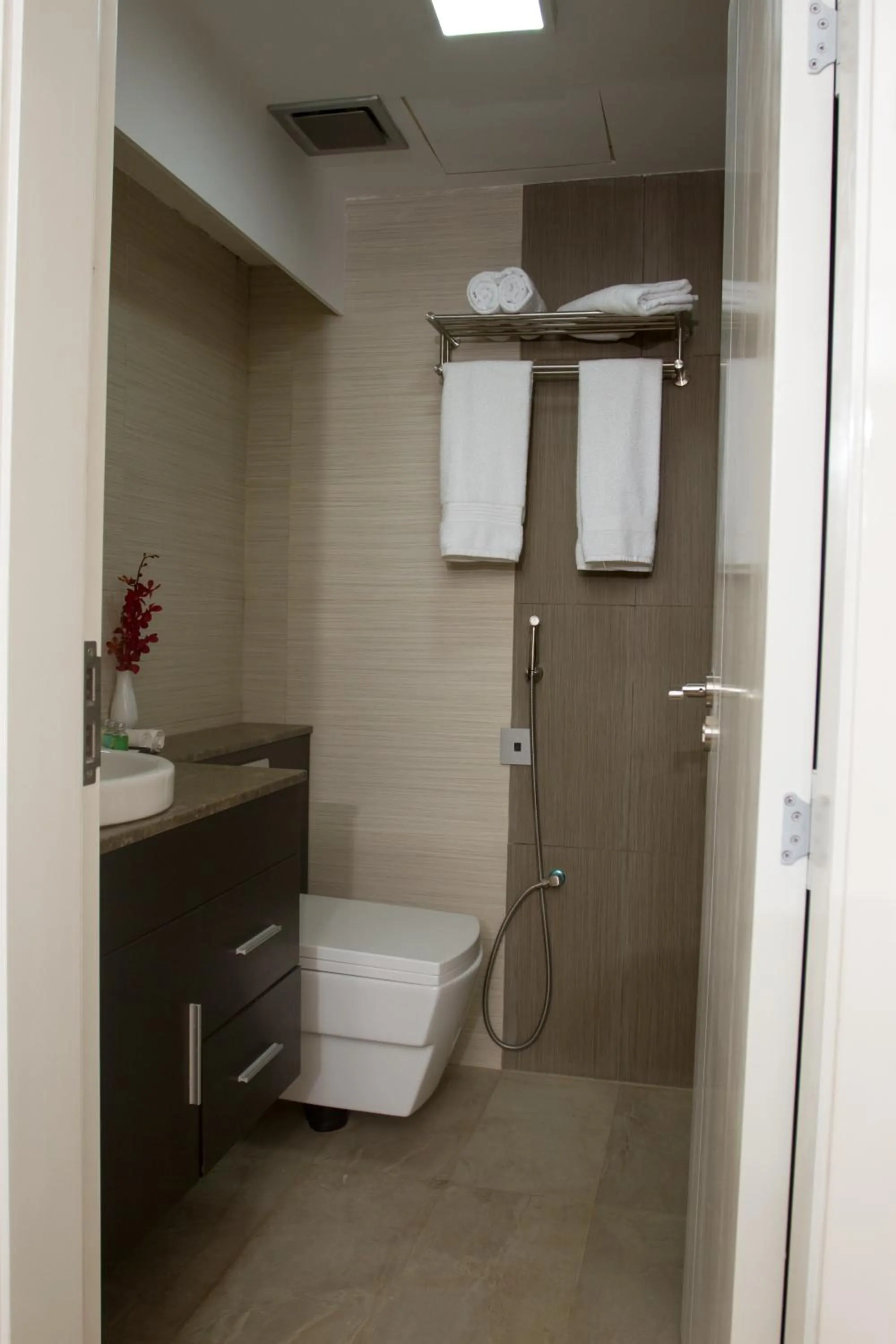 Toilet in Coventina Lake Suites