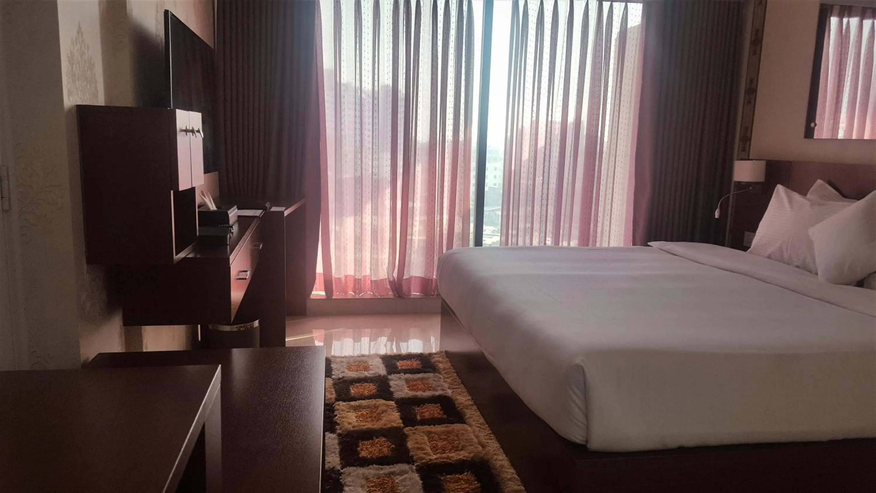 Bed in Coventina Lake Suites