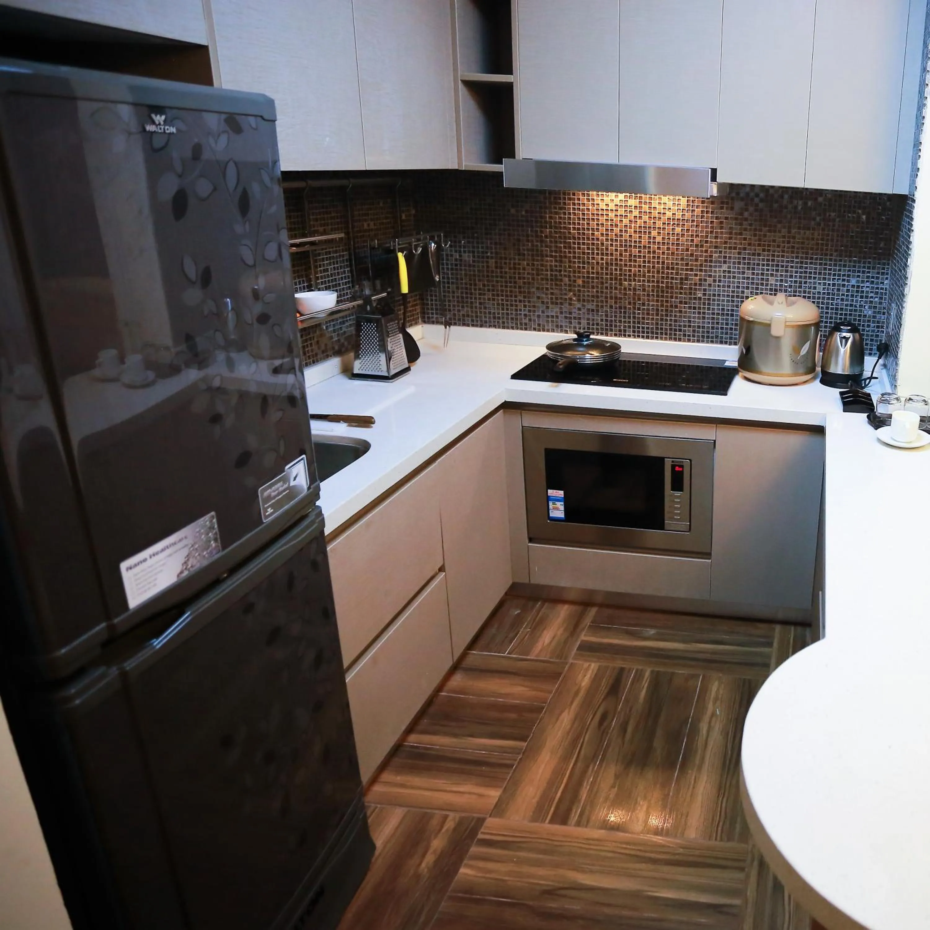 Kitchen or kitchenette in Coventina Lake Suites