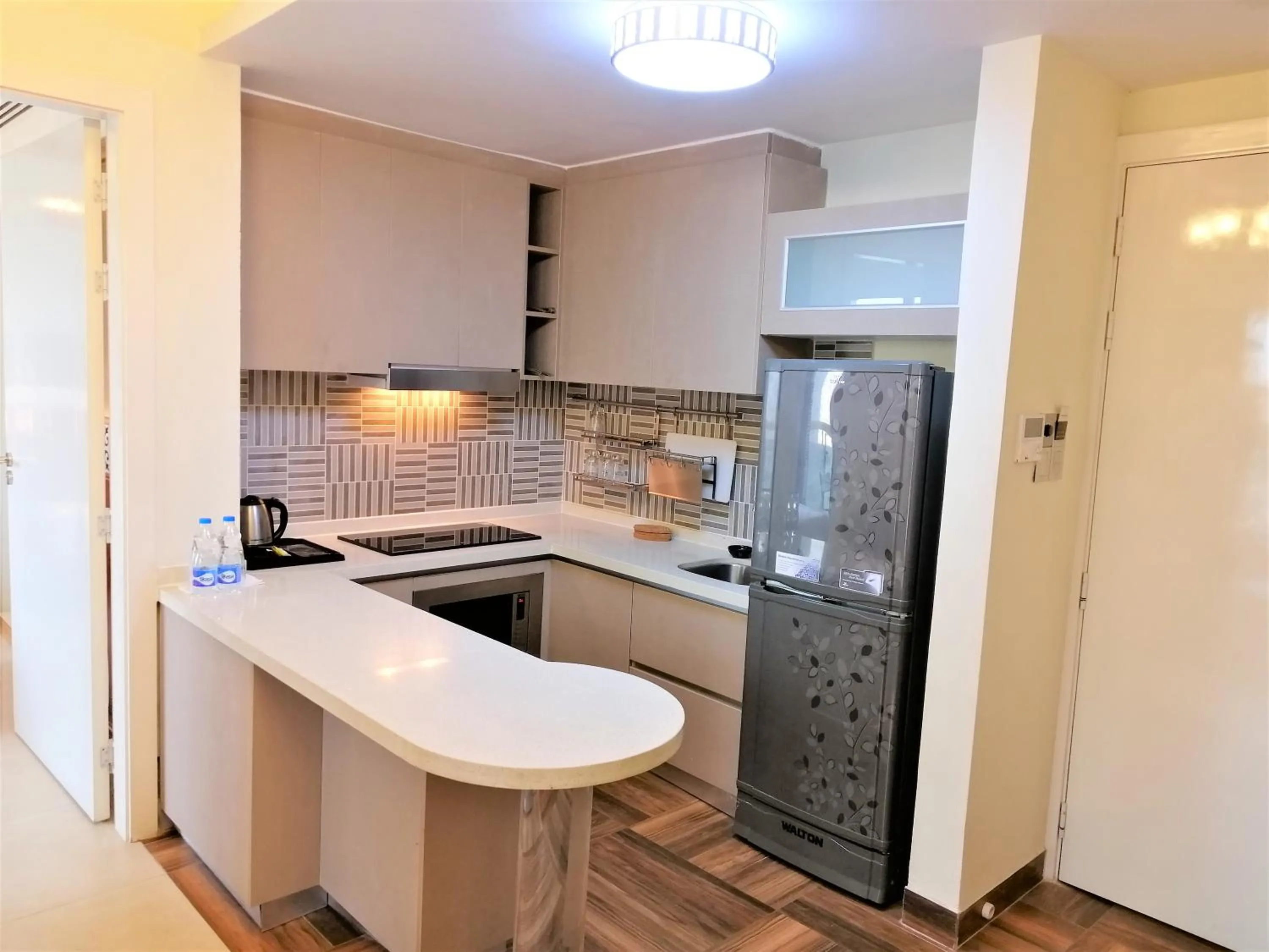 Kitchen or kitchenette in Coventina Lake Suites