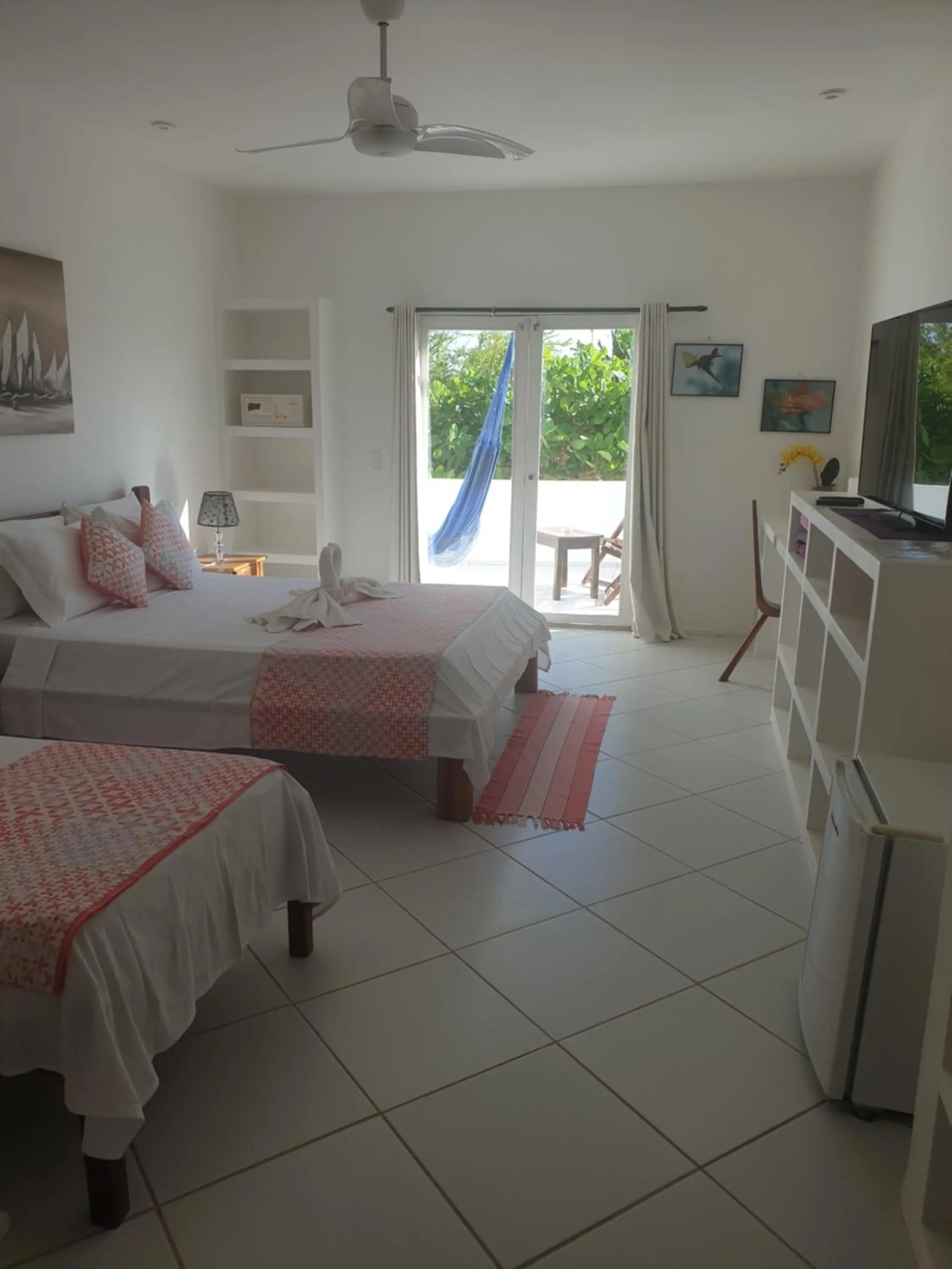 Bed in Pousada Caminho da Praia