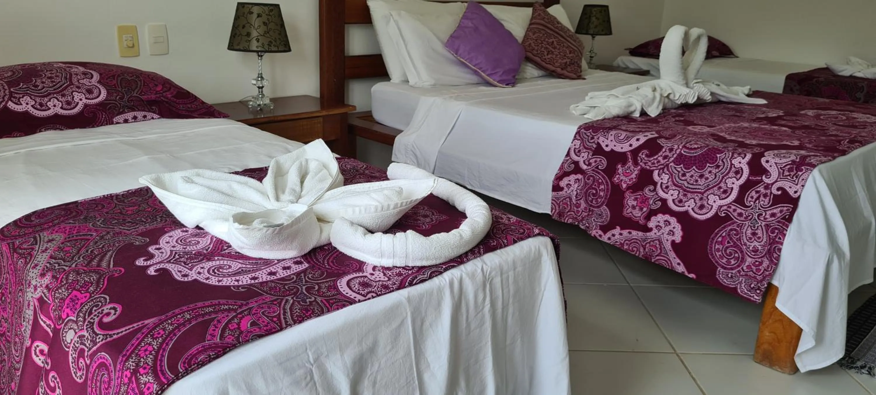 Bed in Pousada Caminho da Praia