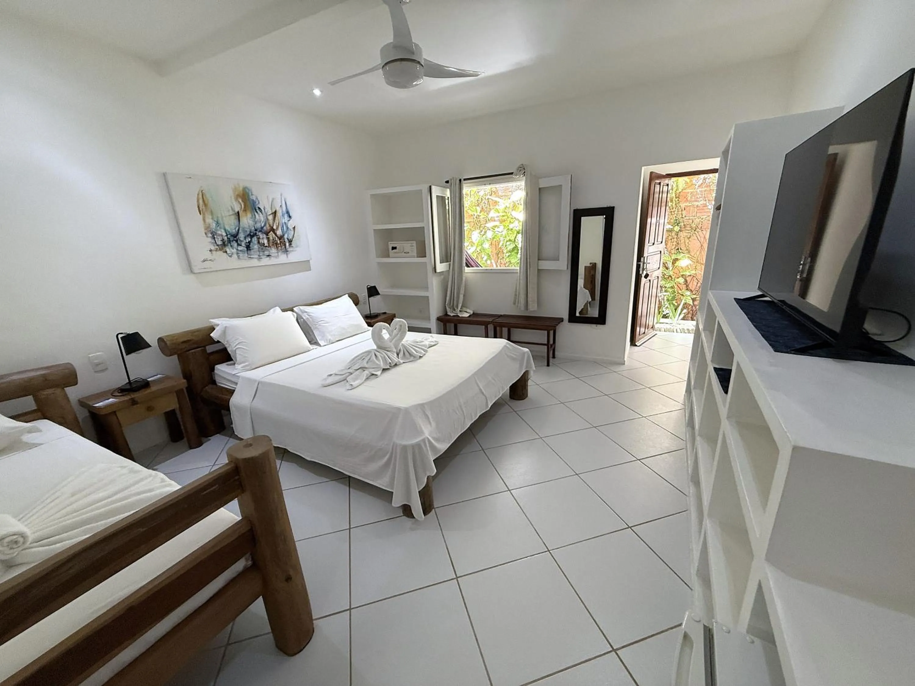 Bed in Pousada Caminho da Praia