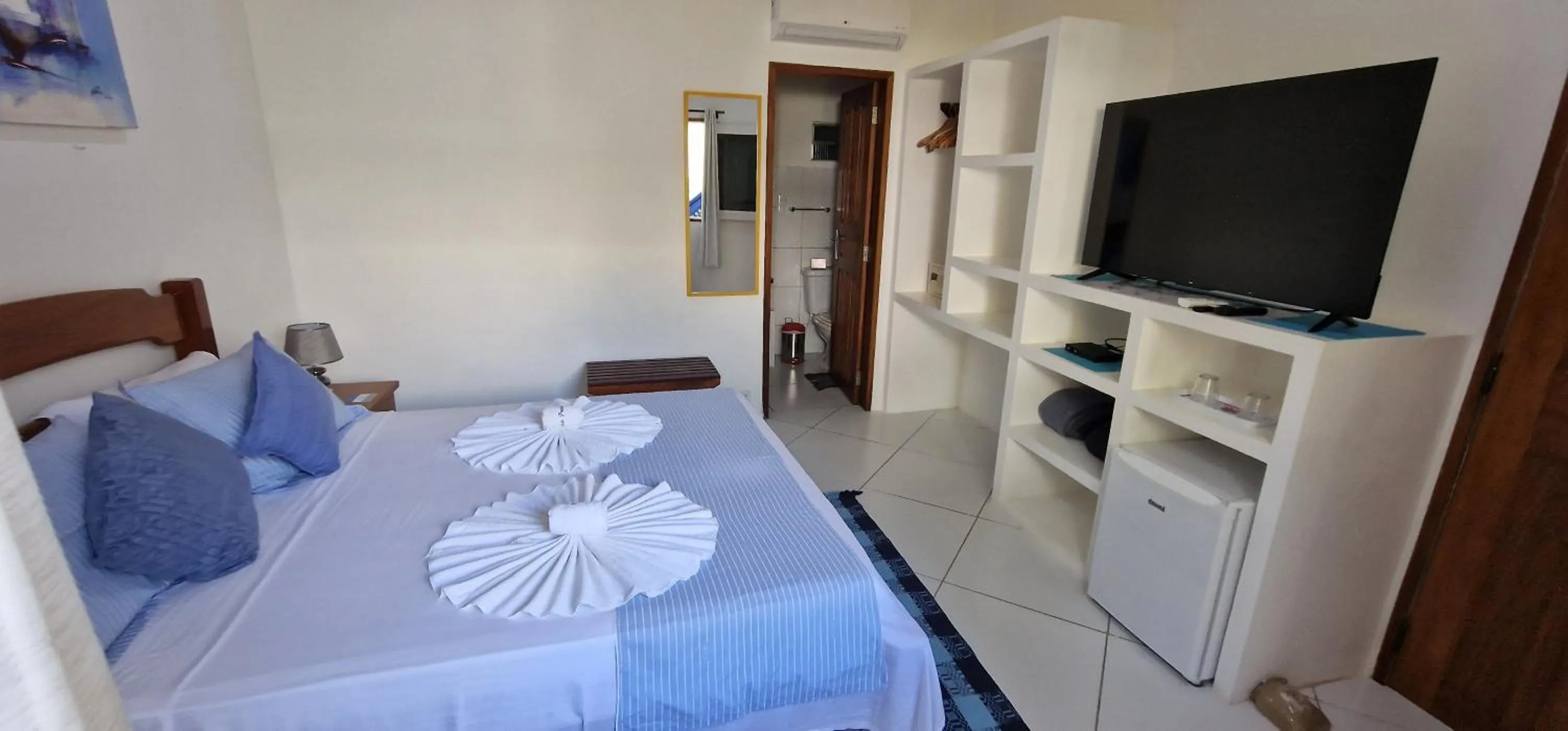 Bed in Pousada Caminho da Praia