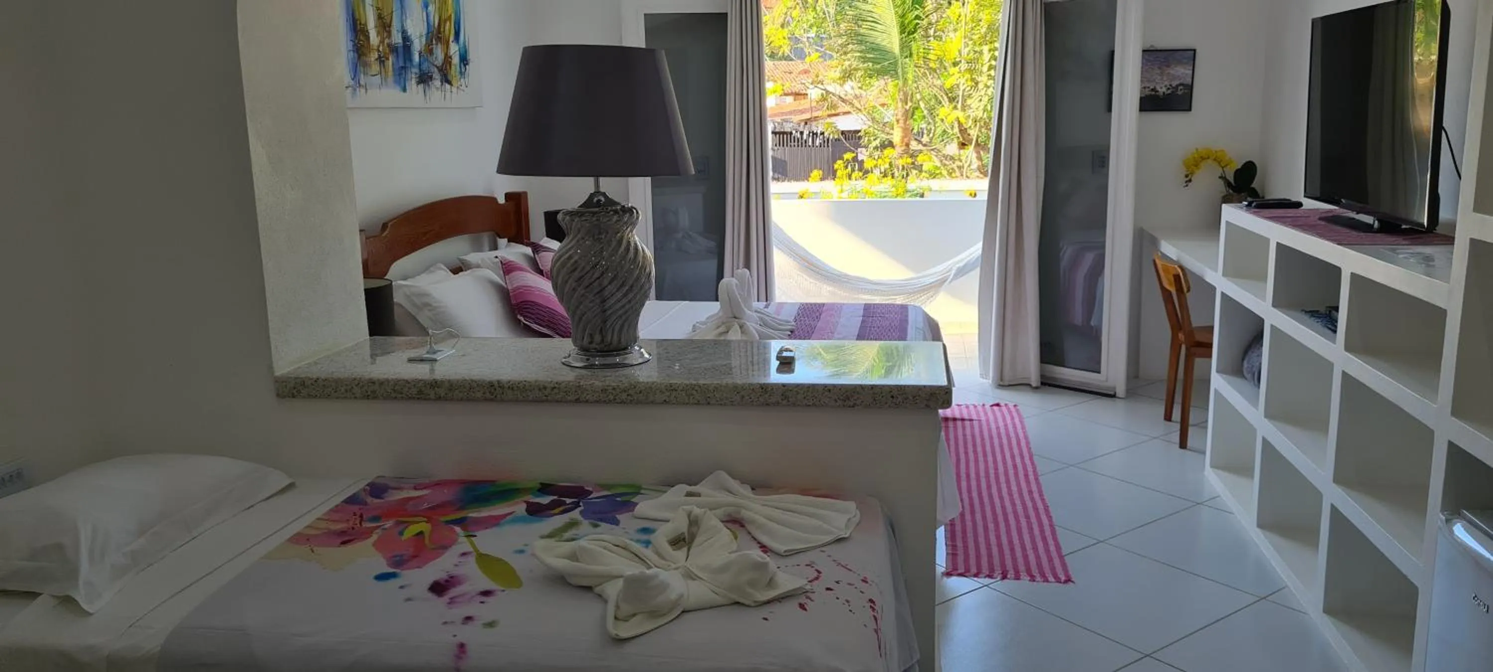 Bed in Pousada Caminho da Praia