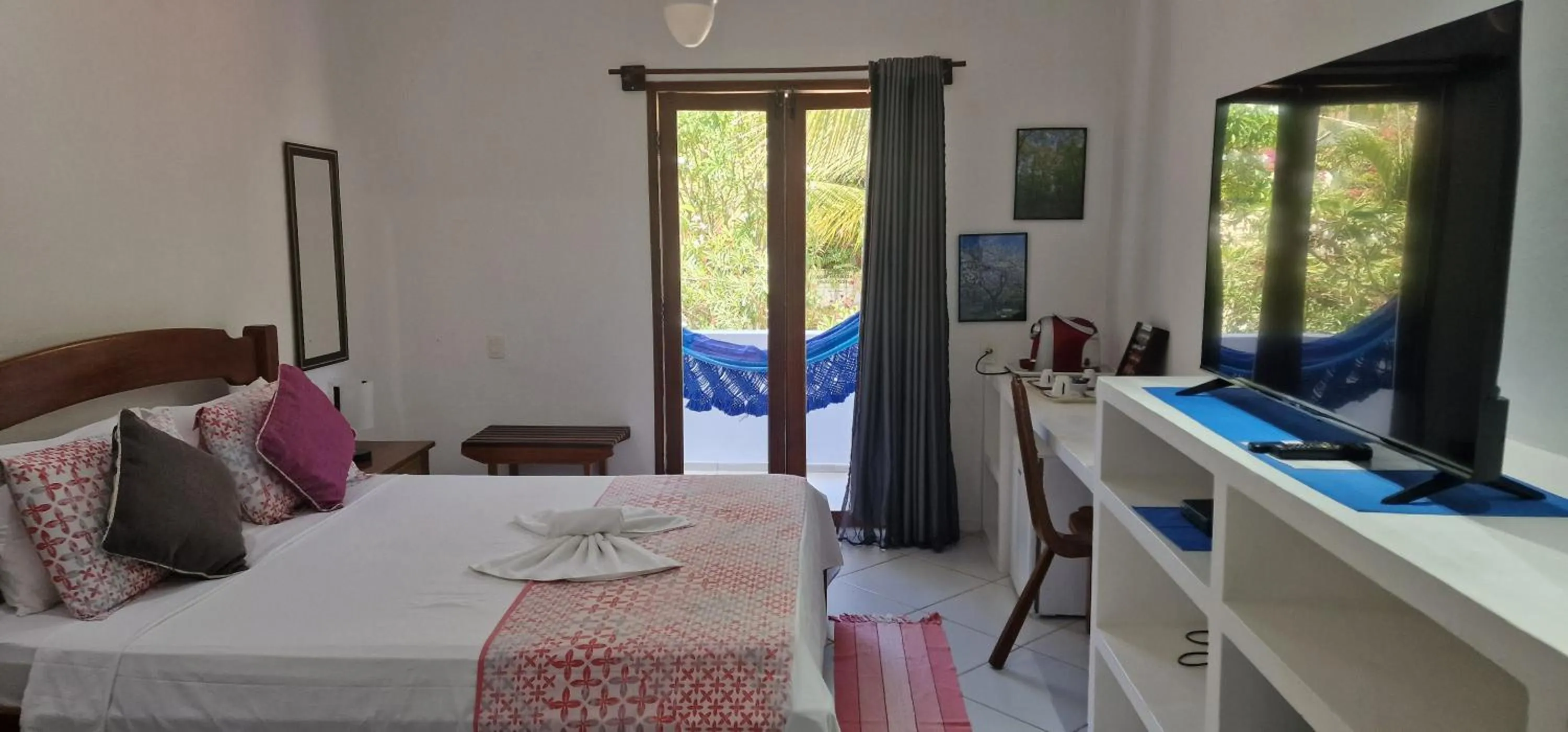 Bed in Pousada Caminho da Praia