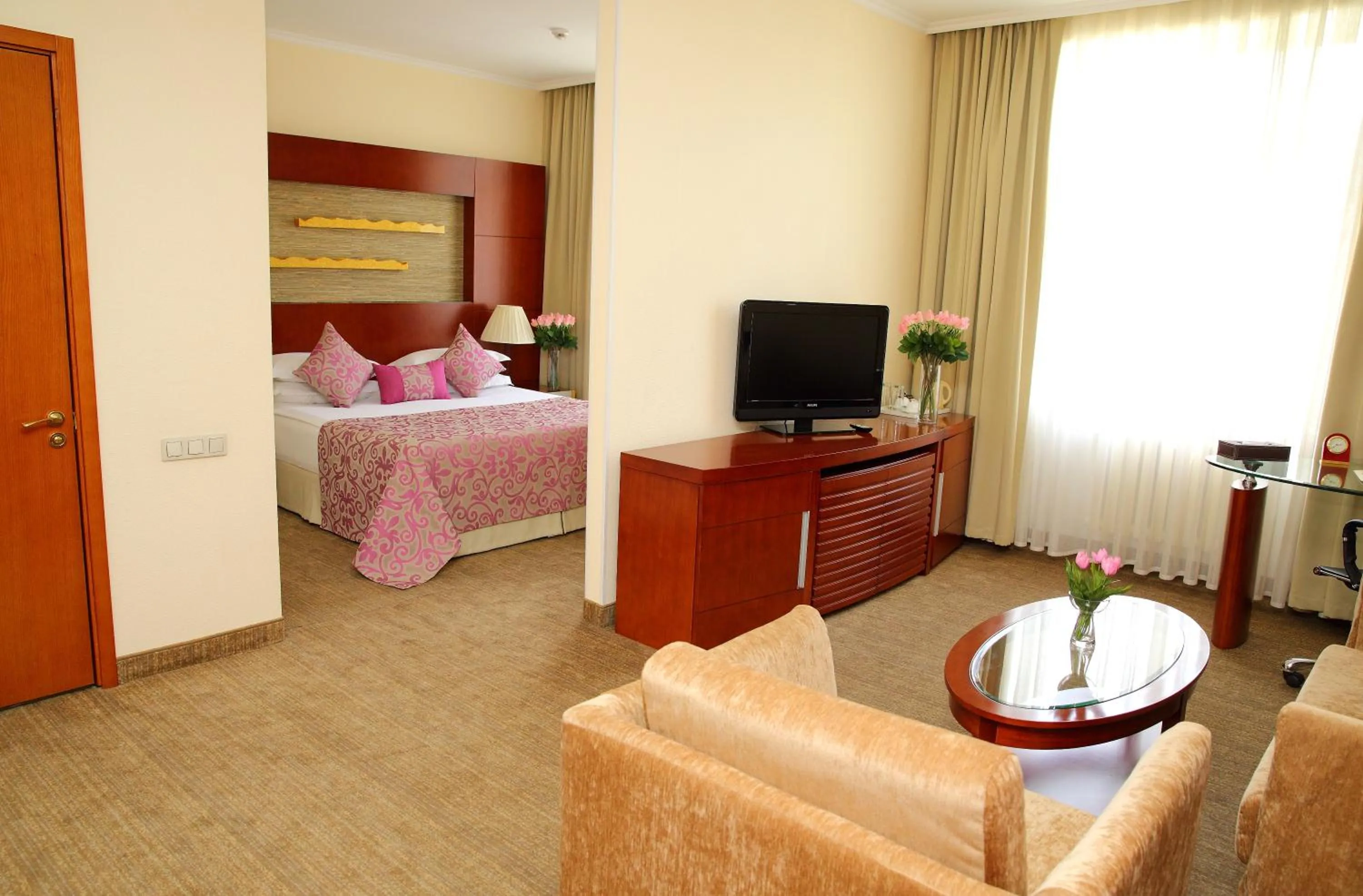 Living room, Bed in Park Hotel Bishkek