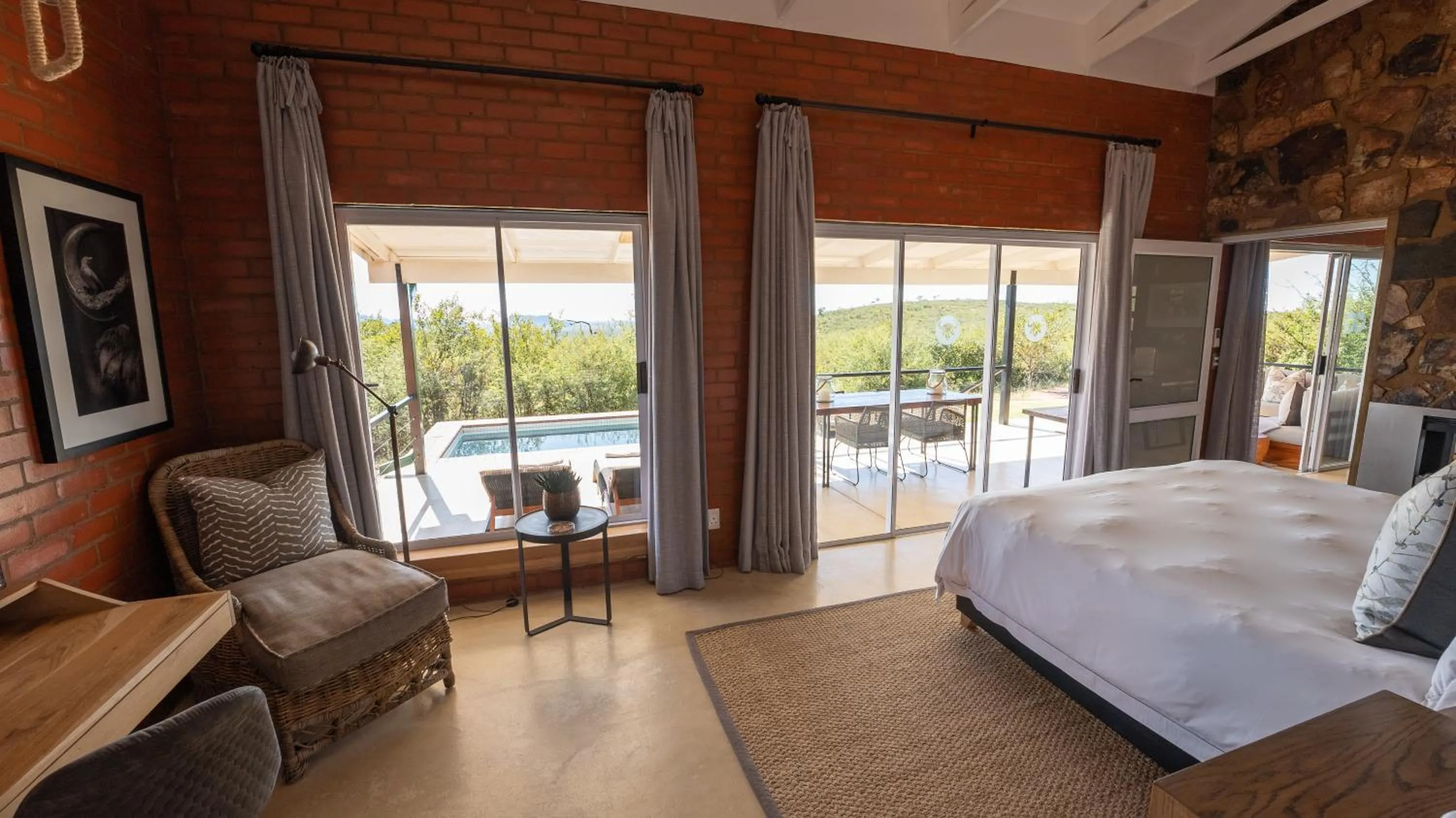 Pool view, Bed in Rockfig Lodge Madikwe