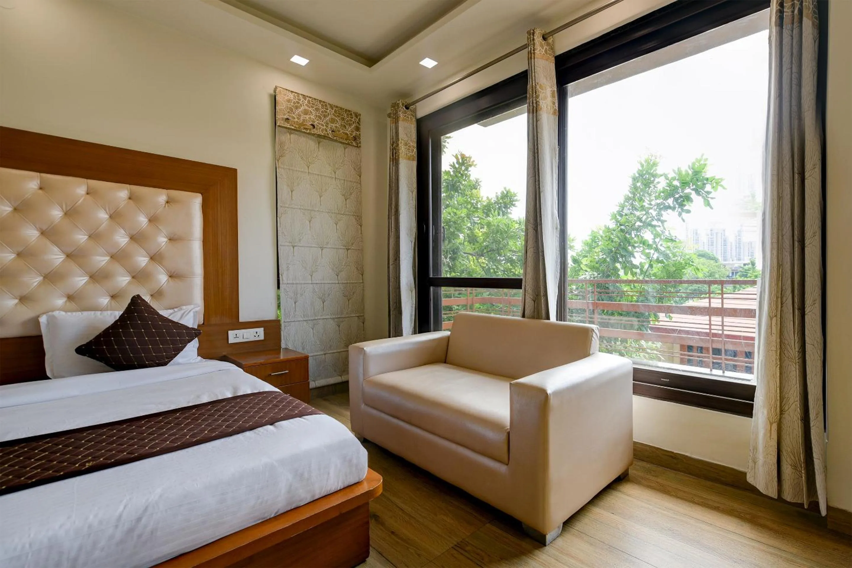 Photo of the whole room in Hotel Leaf 9 Boutique, Near Golf Course Road and Galleria Market