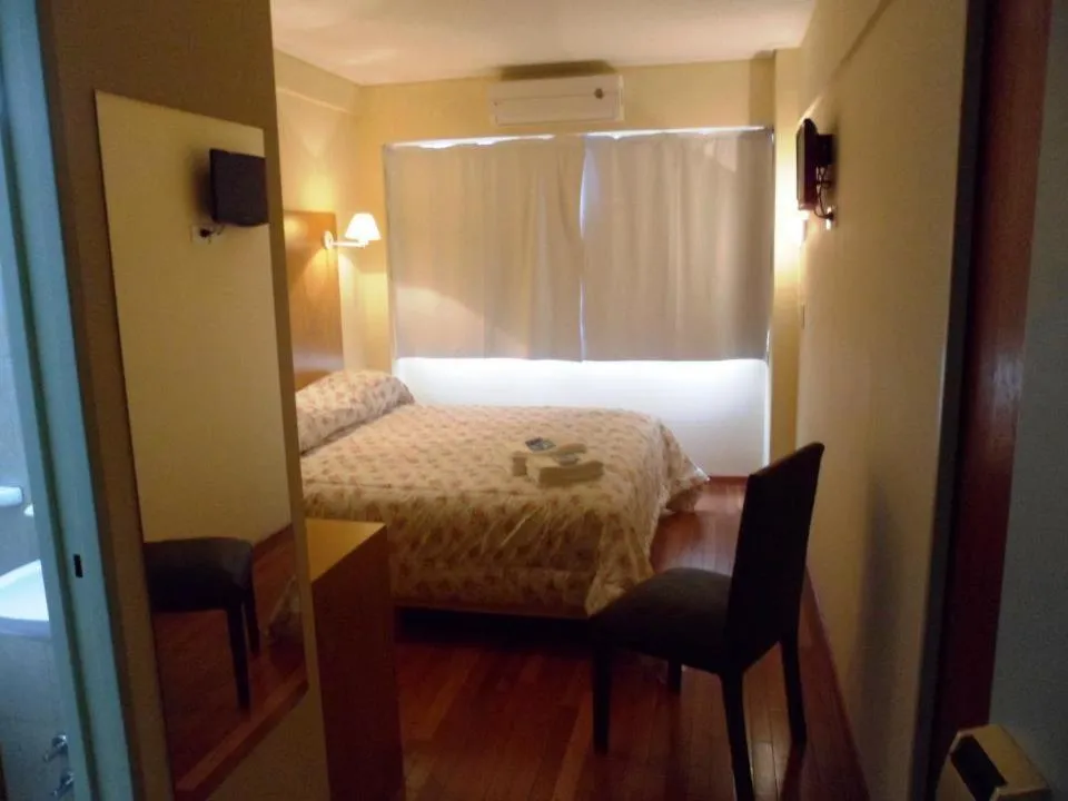 Photo of the whole room, Bed in Hotel Juramento