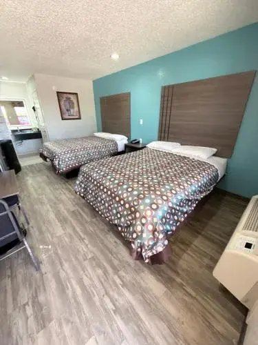 Queen Room with Two Queen Beds in Relax Inn Bryan College Station Queen Room with Two Queen Beds in Relax Inn Bryan College Station