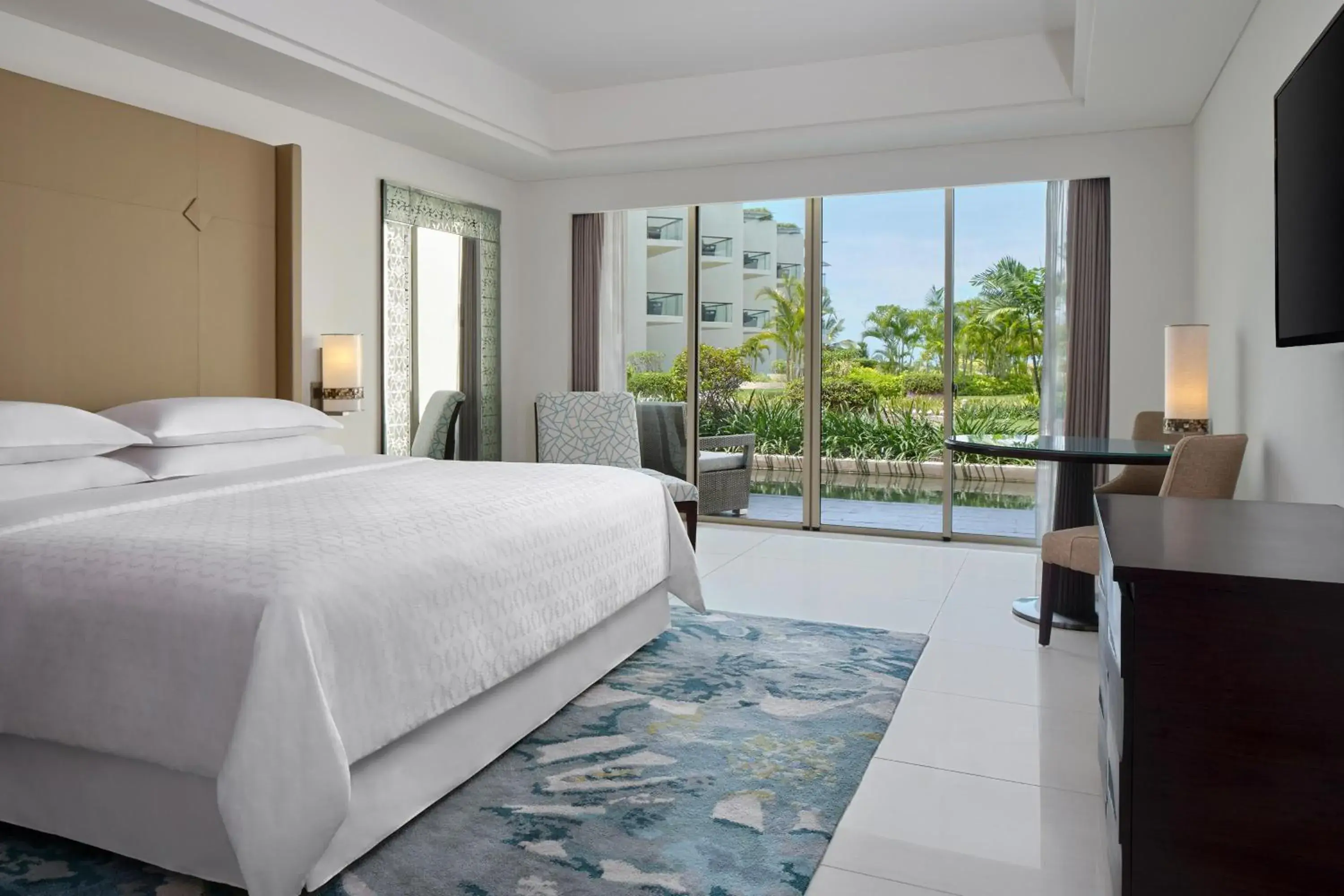 Guest Room Garden View, 1 King Bed (suitable for 2 adults & 2 children below 12 y.o. or 3 adults with Extra Bed) in Sheraton Bali Kuta Resort Guest Room Garden View, 1 King Bed (suitable for 2 adults & 2 children below 12 y.o. or 3 adults with Extra Bed) in Sheraton Bali Kuta Resort