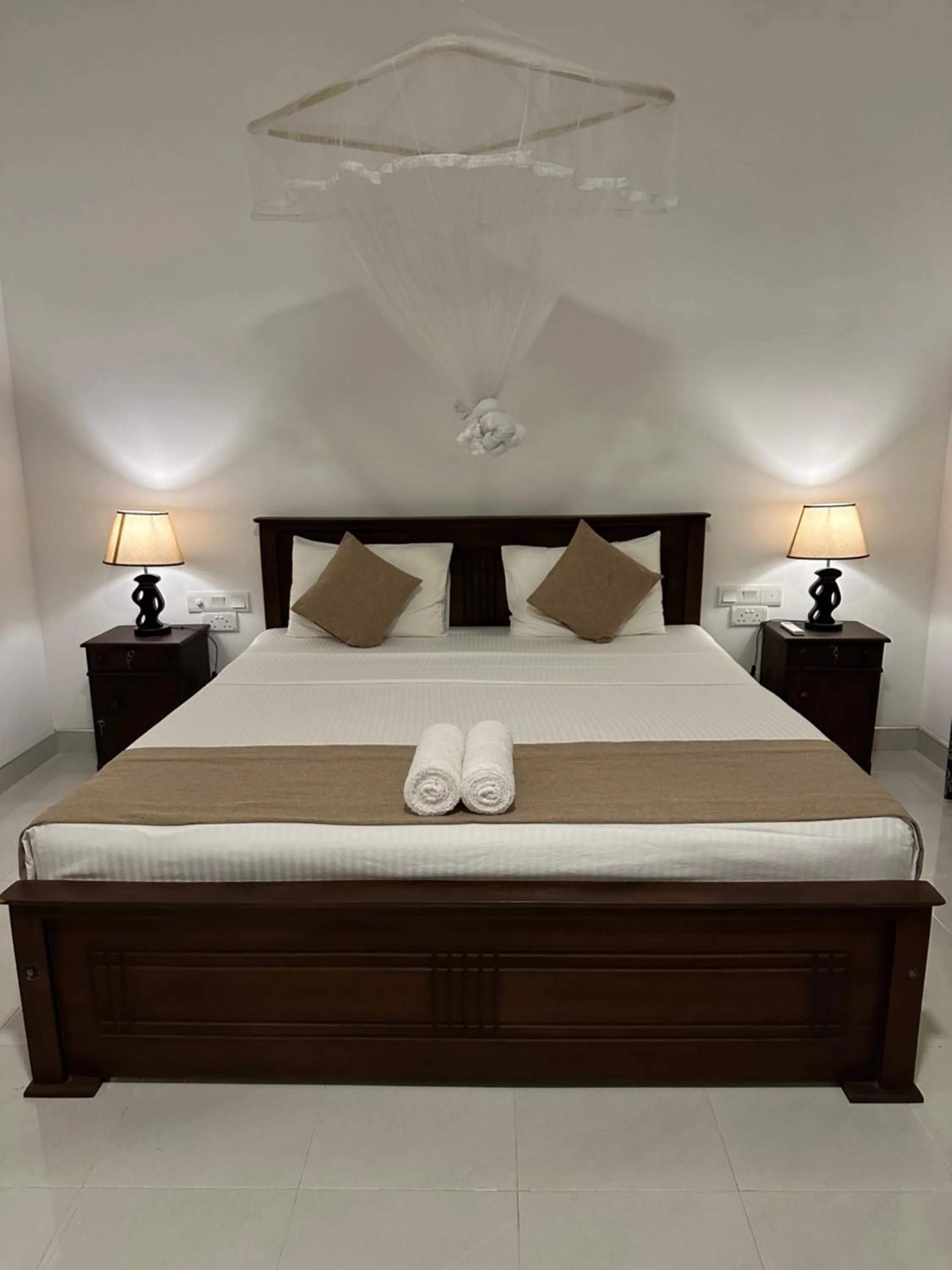 Bed in Sigiri Hibiscus Villa