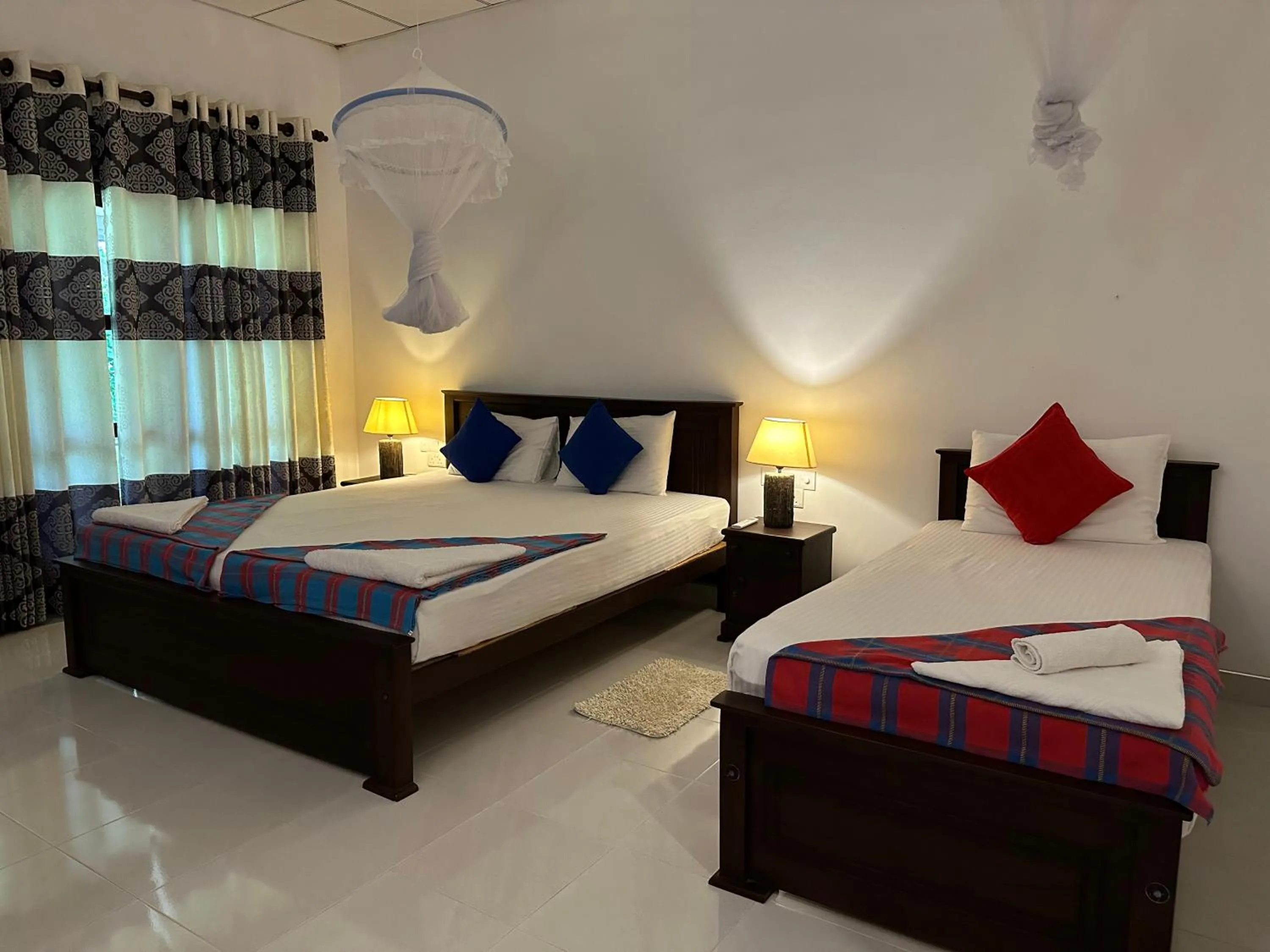 Bed in Sigiri Hibiscus Villa