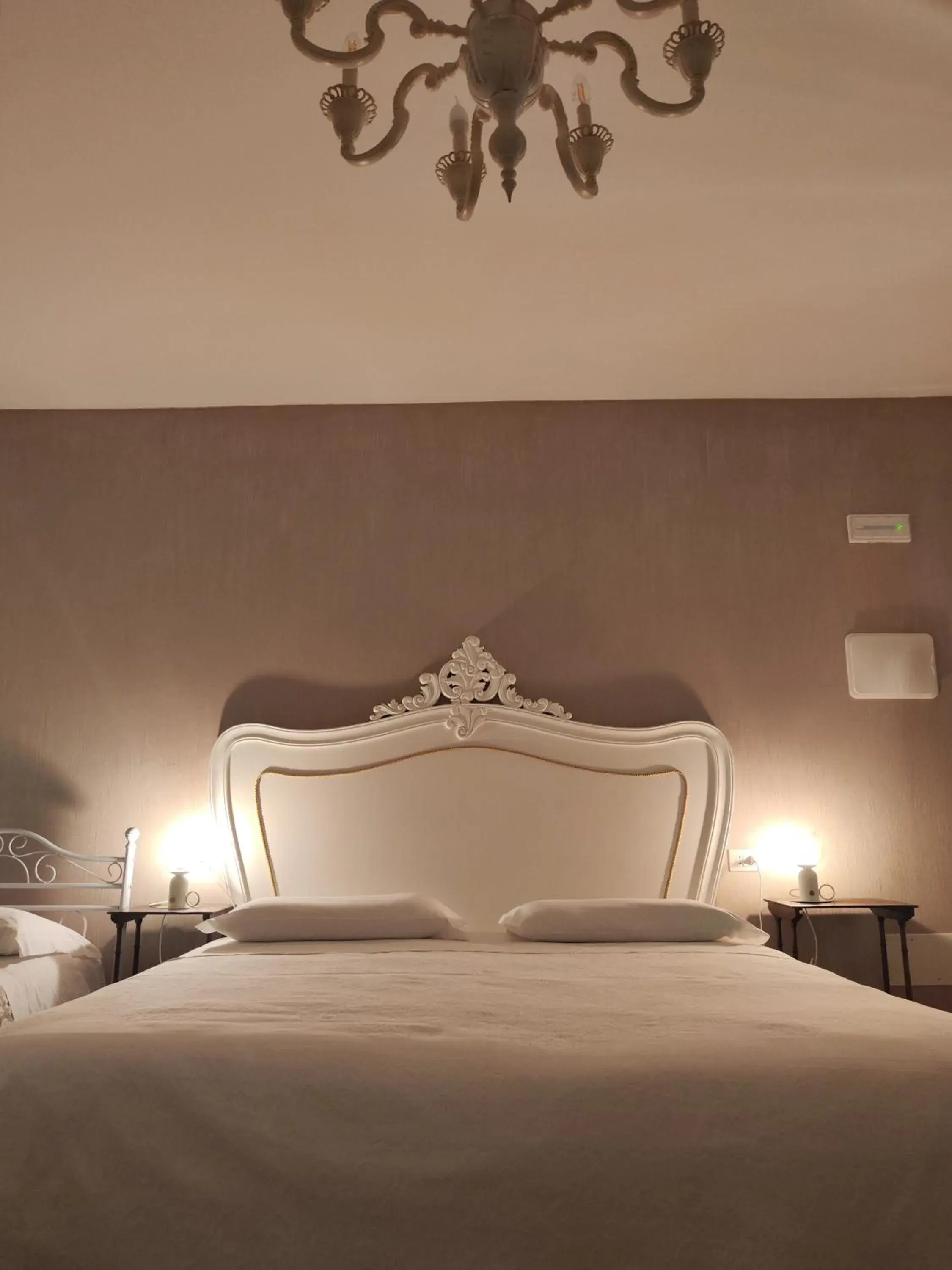 Deluxe Quadruple Room - single occupancy in Garda Relais Antica Romelia Deluxe Quadruple Room - single occupancy in Garda Relais Antica Romelia