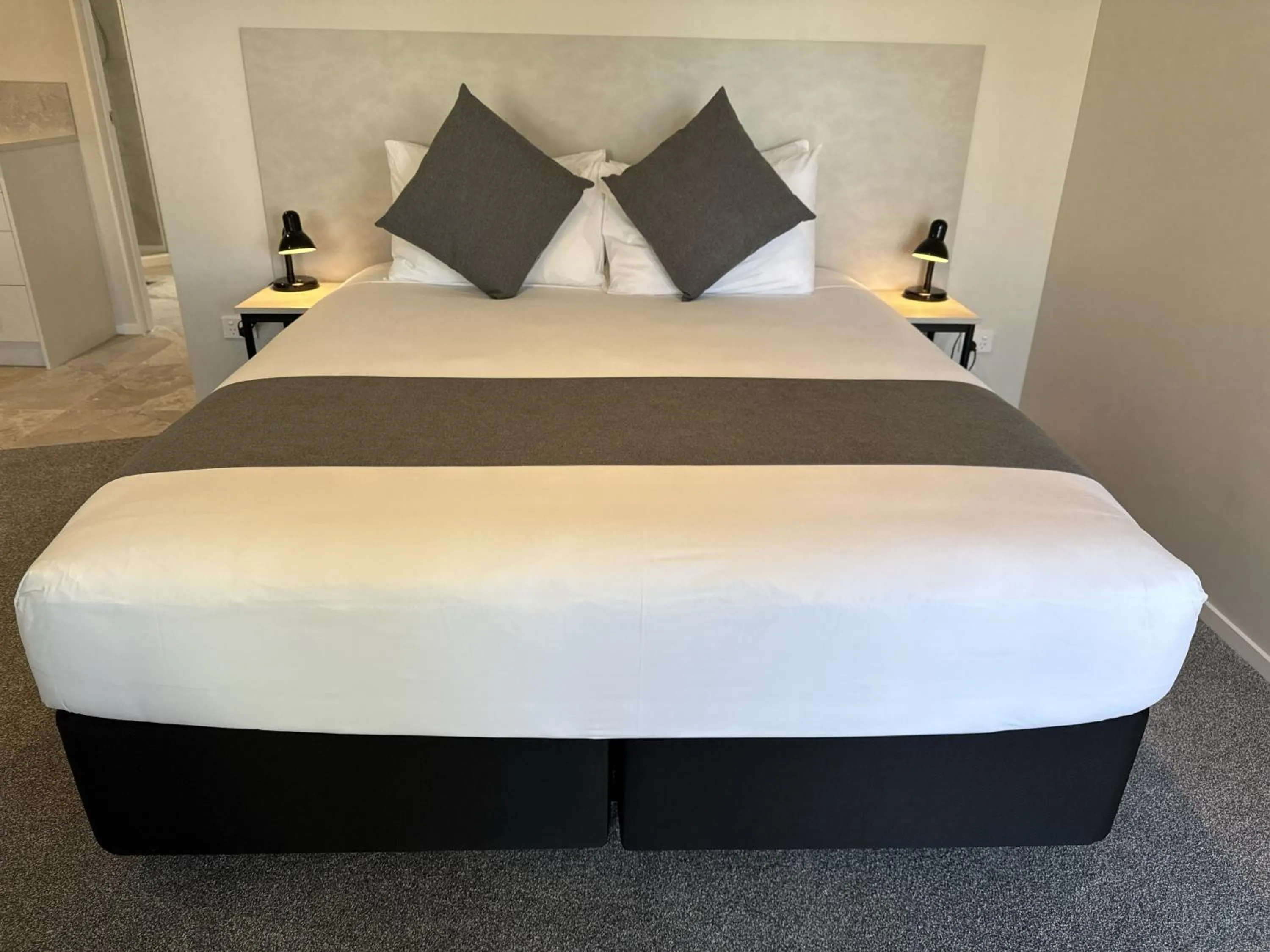 Bed in BKs Pioneer Motel