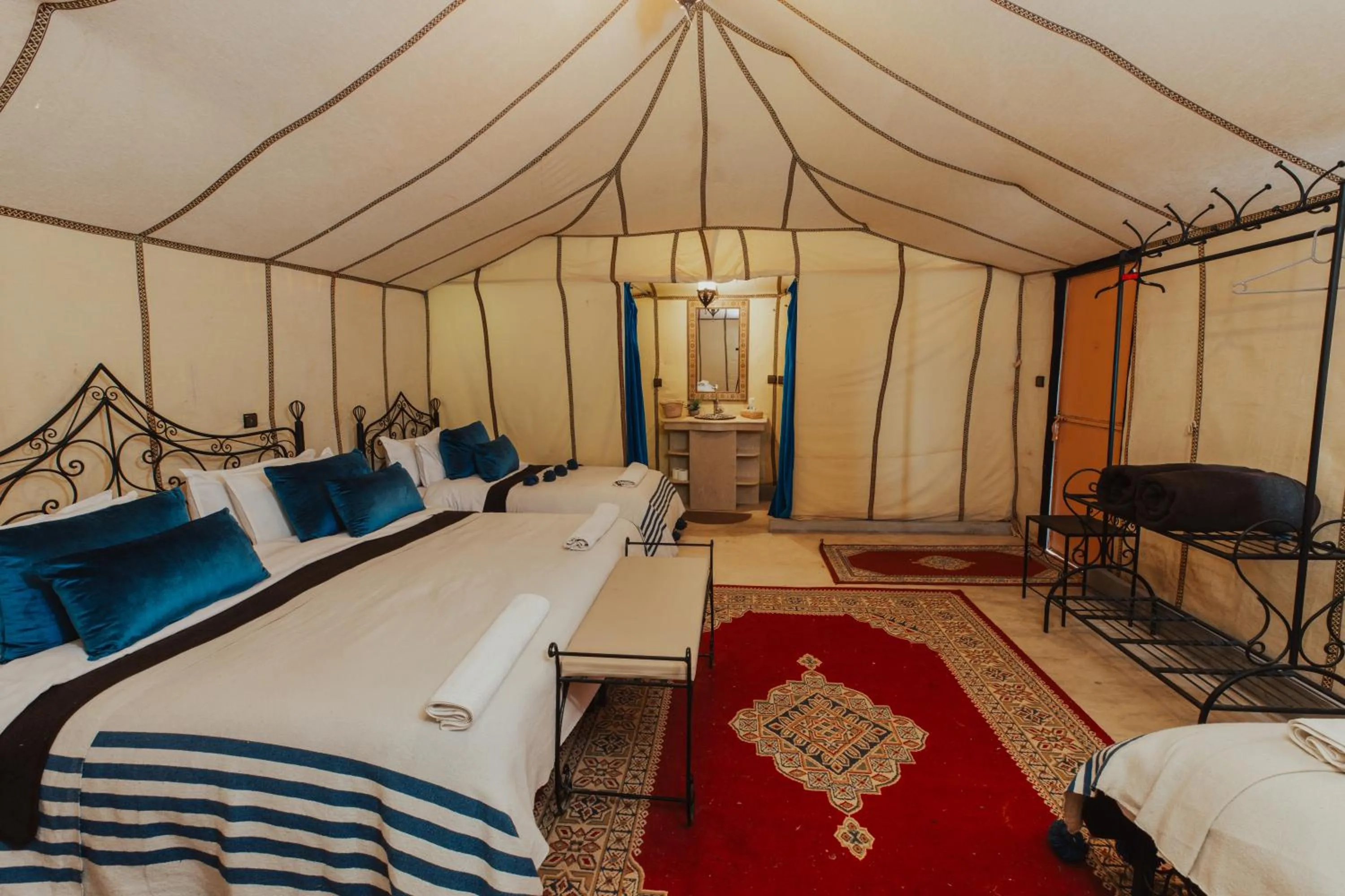 Bed in Tassili Luxury Desert Camp